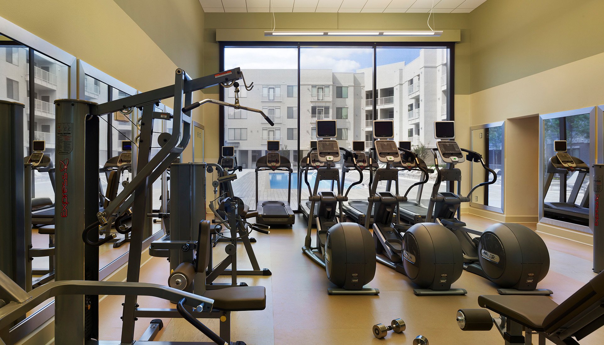 AVE Clifton fitness center with pool view