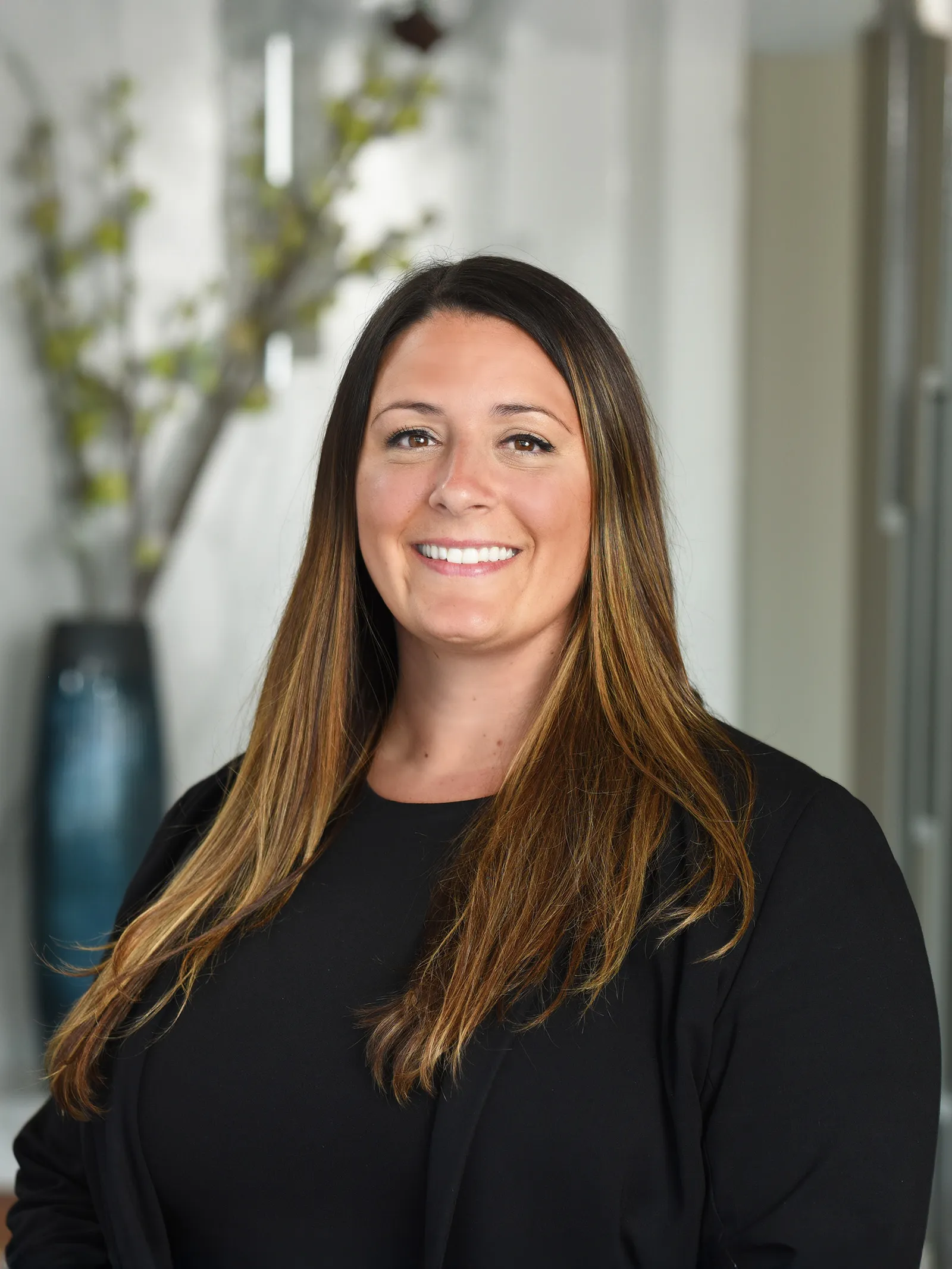 a woman smiling at camera