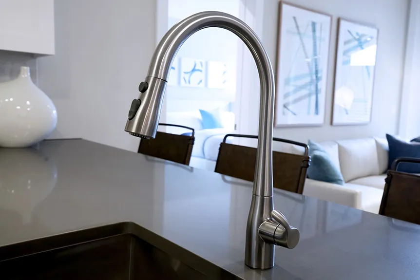 a Kohler faucet on a counter