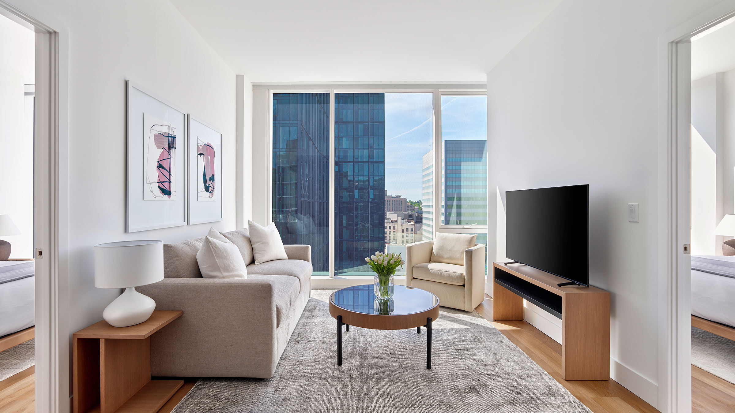 a living room with a television and a couch