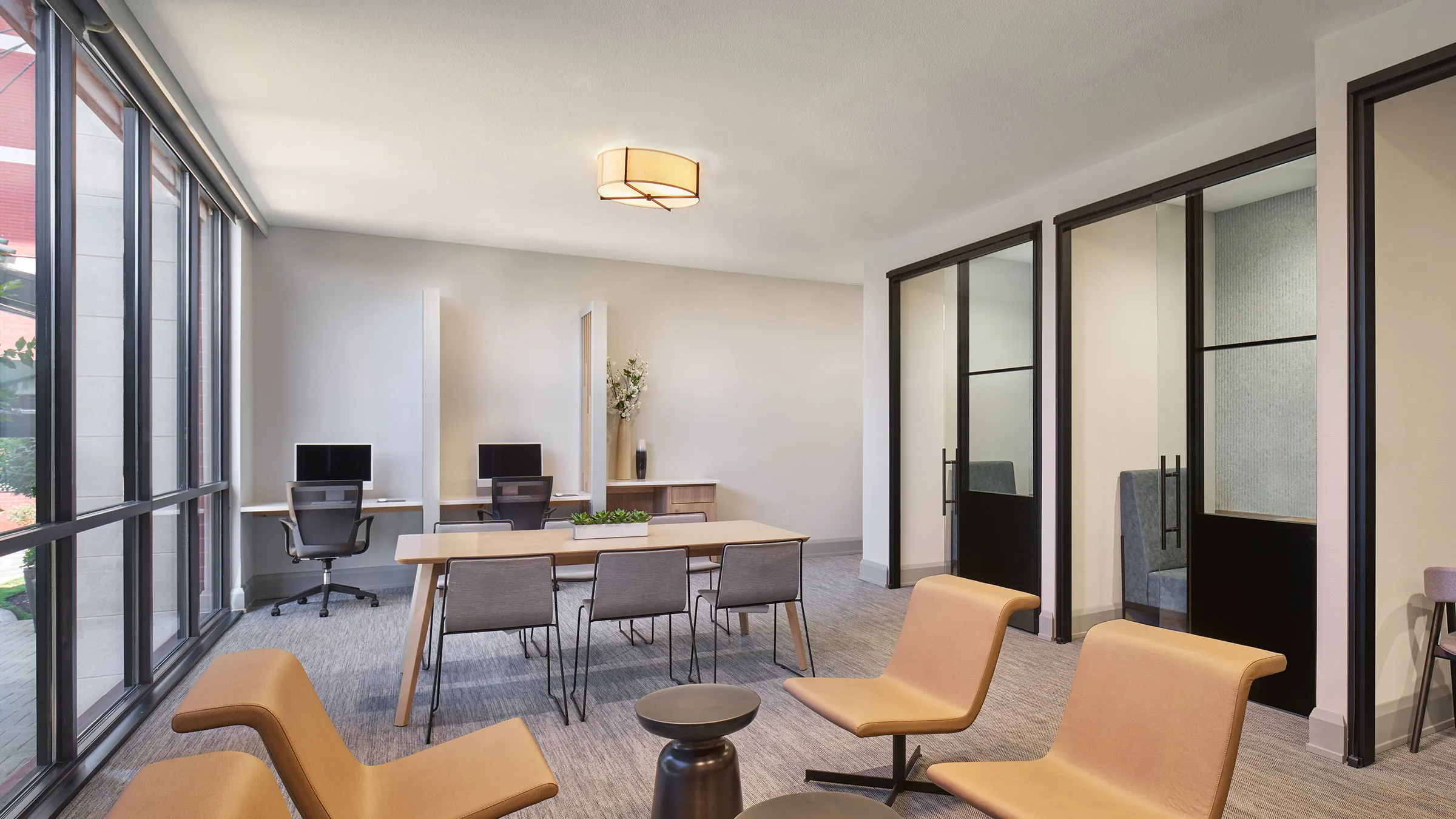 a room with chairs and tables