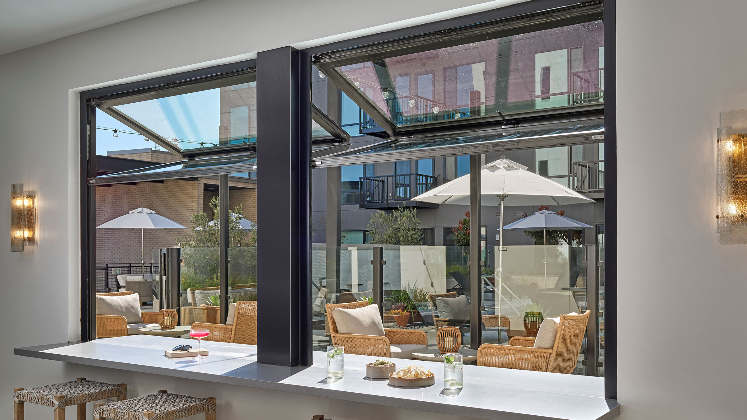 a glass windows with a table and chairs