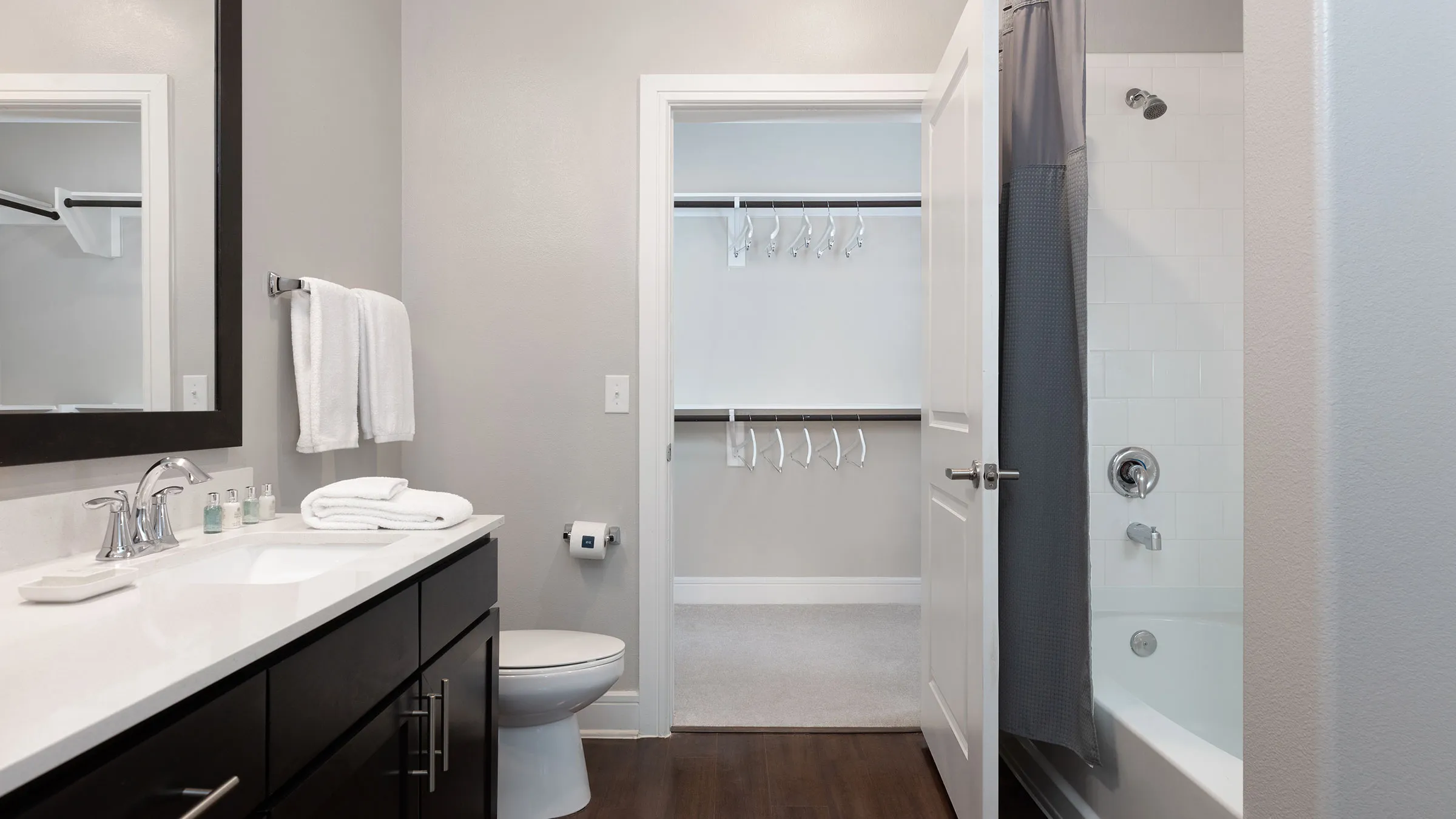 a bathroom with a toilet and a bathtub