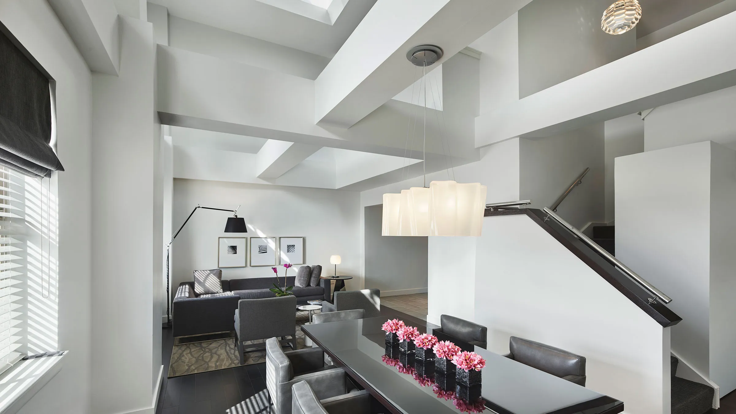 a room with a table and chairs