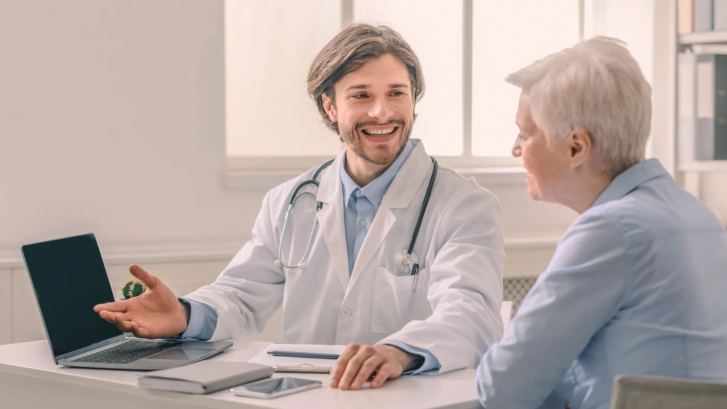 medical doctor speaking to patient