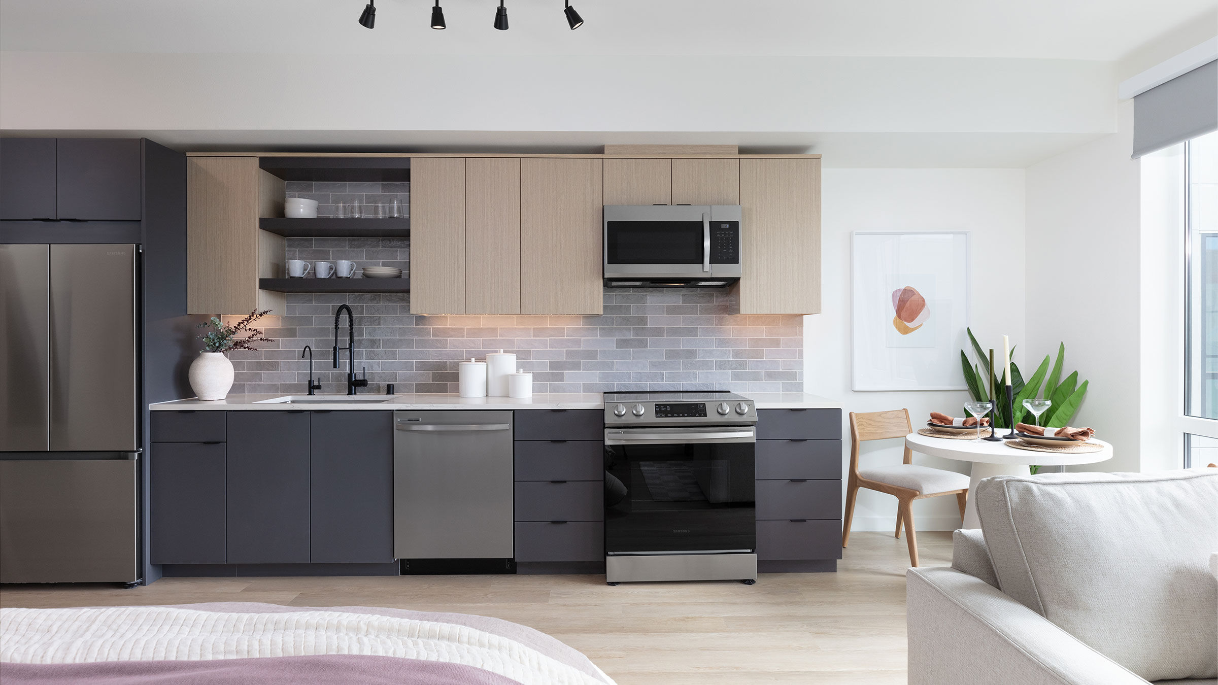 a kitchen with a microwave oven and a table
