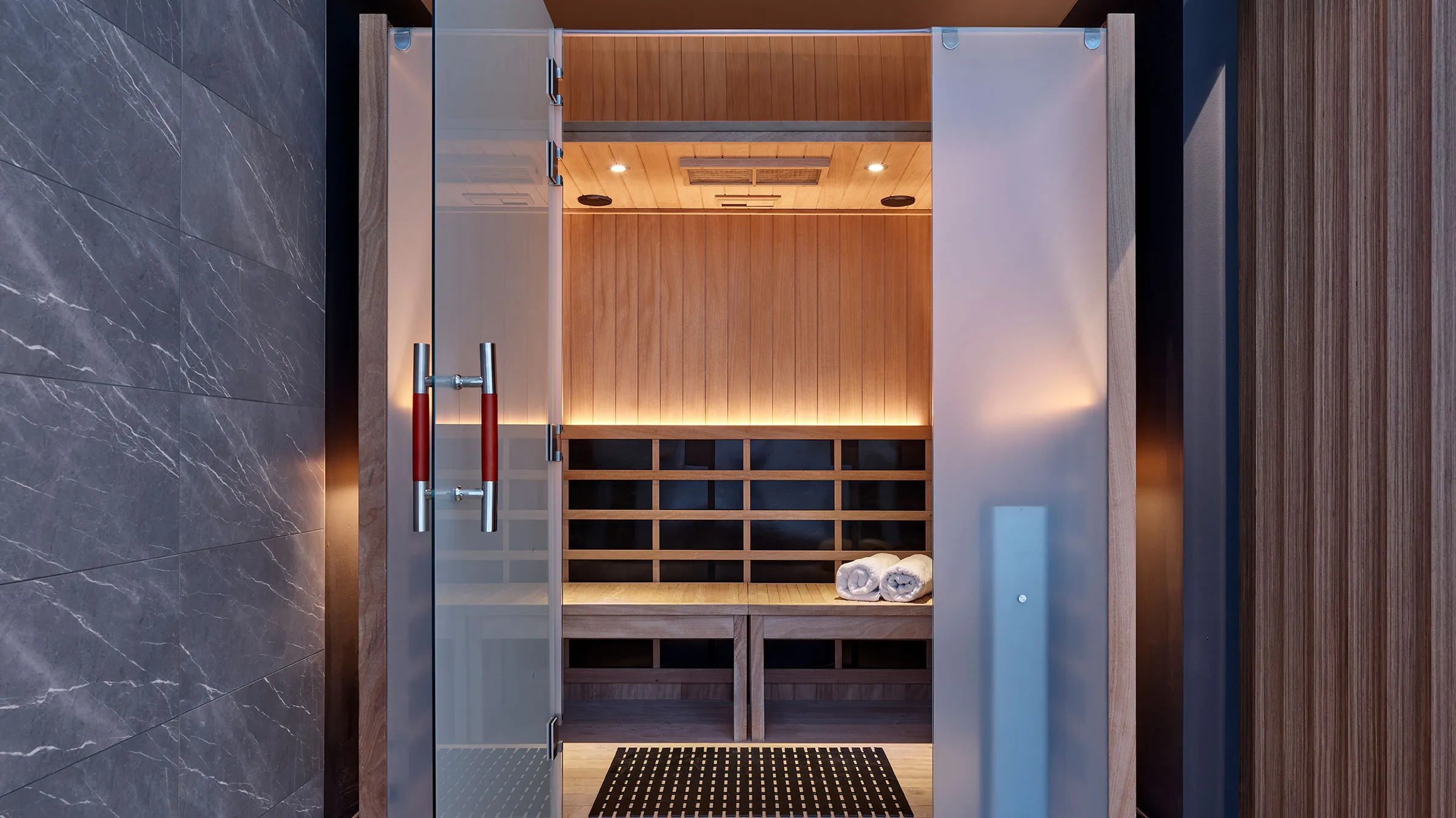 a glass door of a sauna