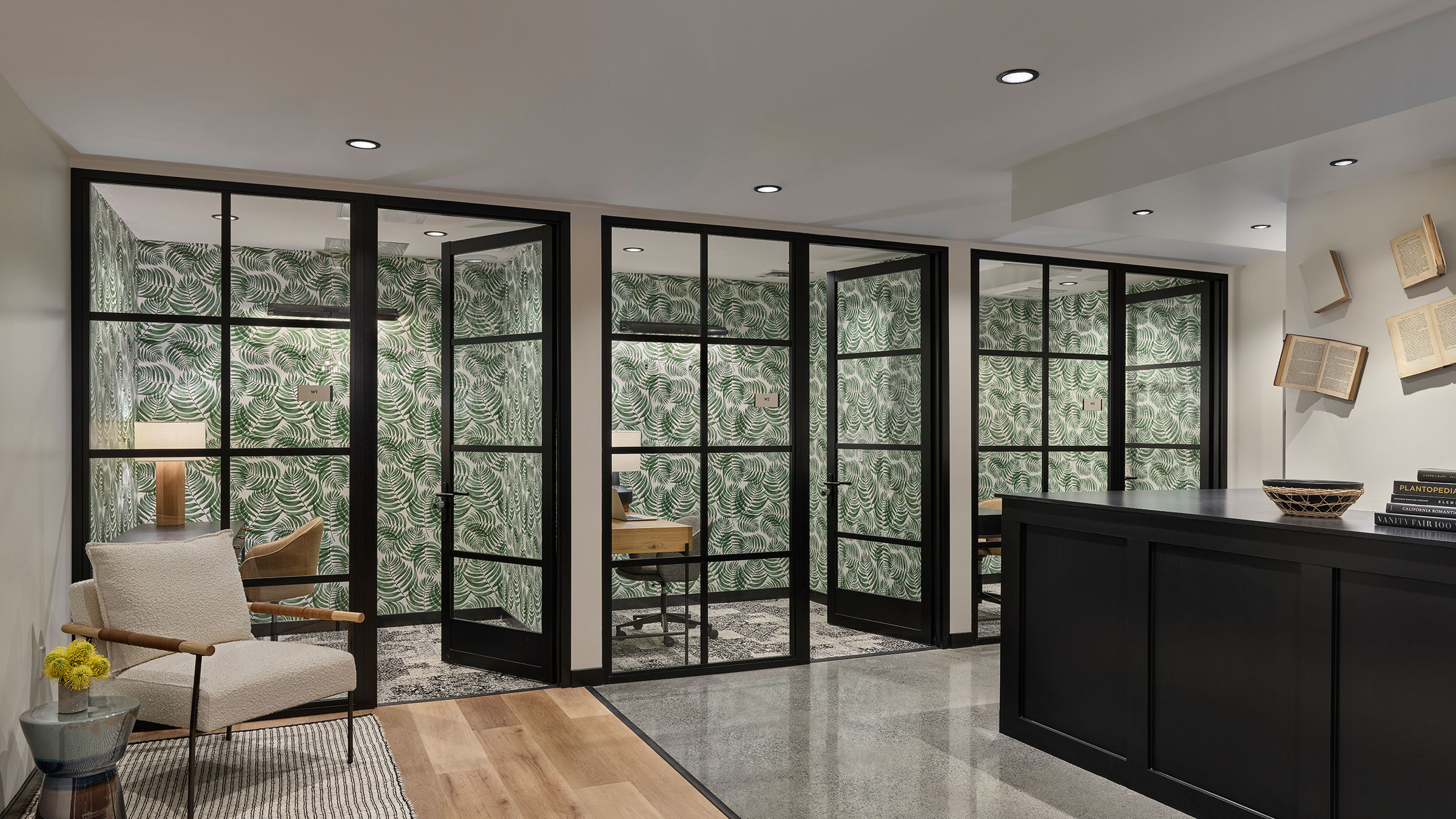 a room with glass doors and a desk