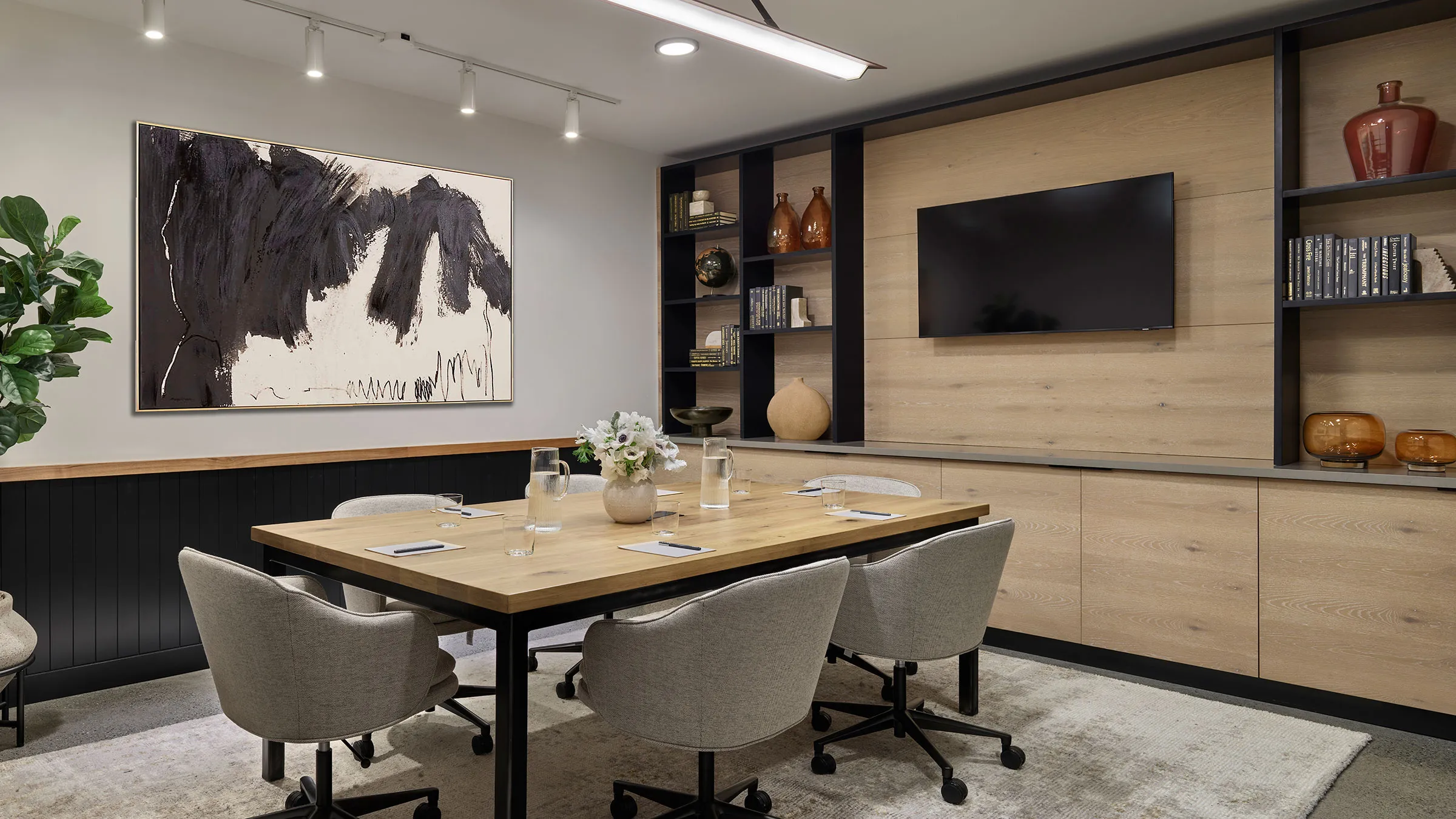 a room with a table and chairs