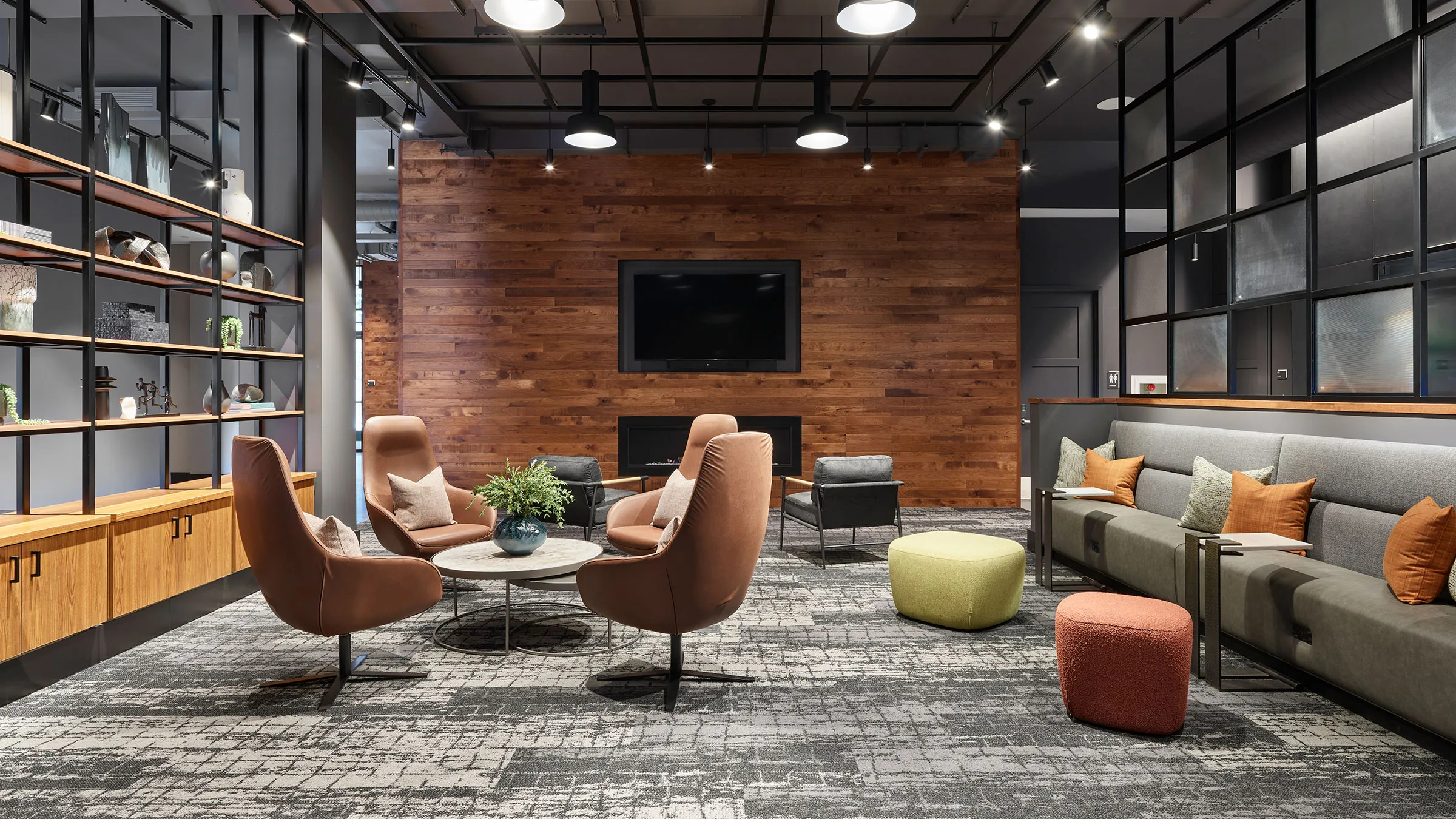 a room with a television and chairs