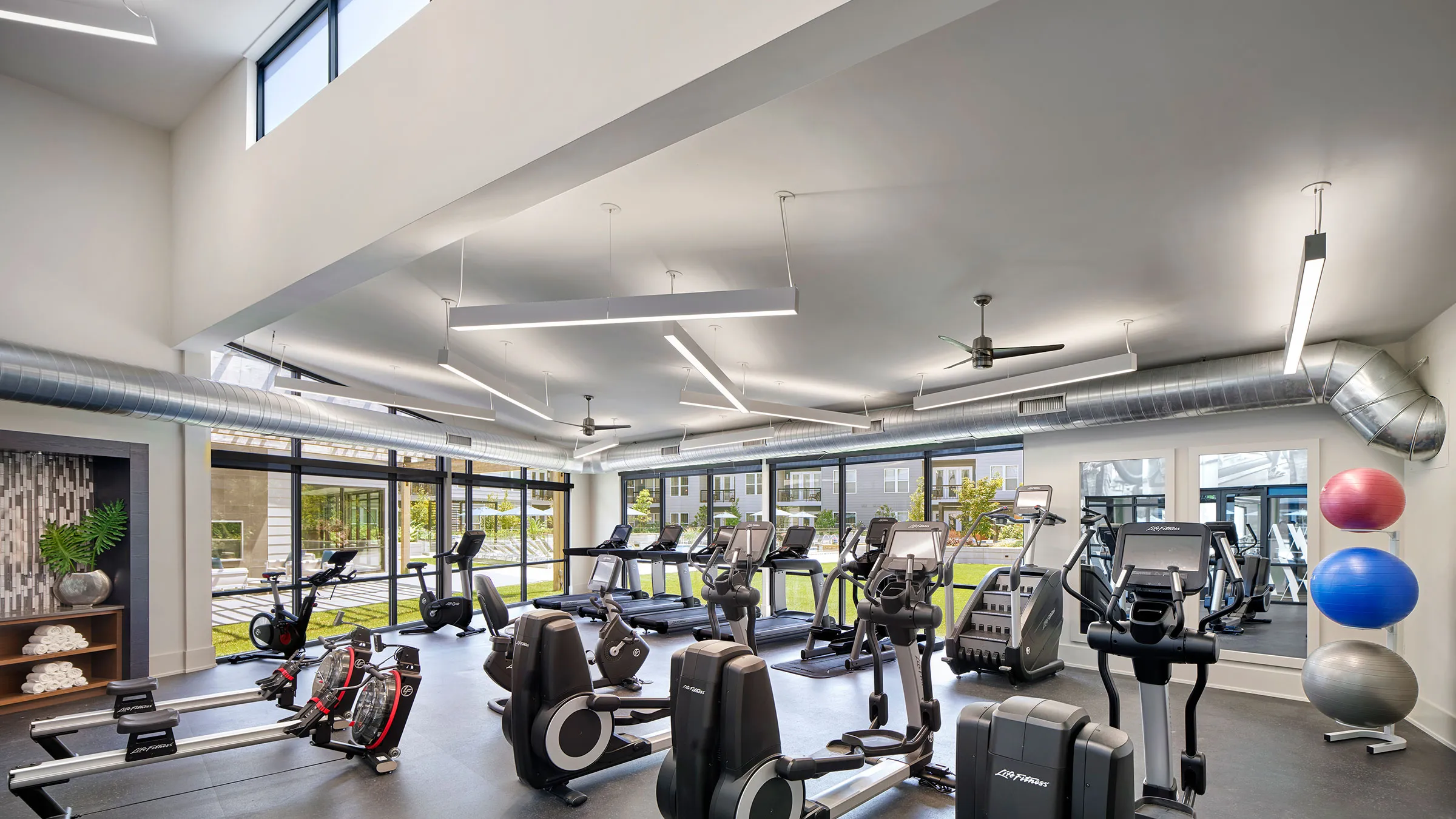 a large gym with exercise equipment