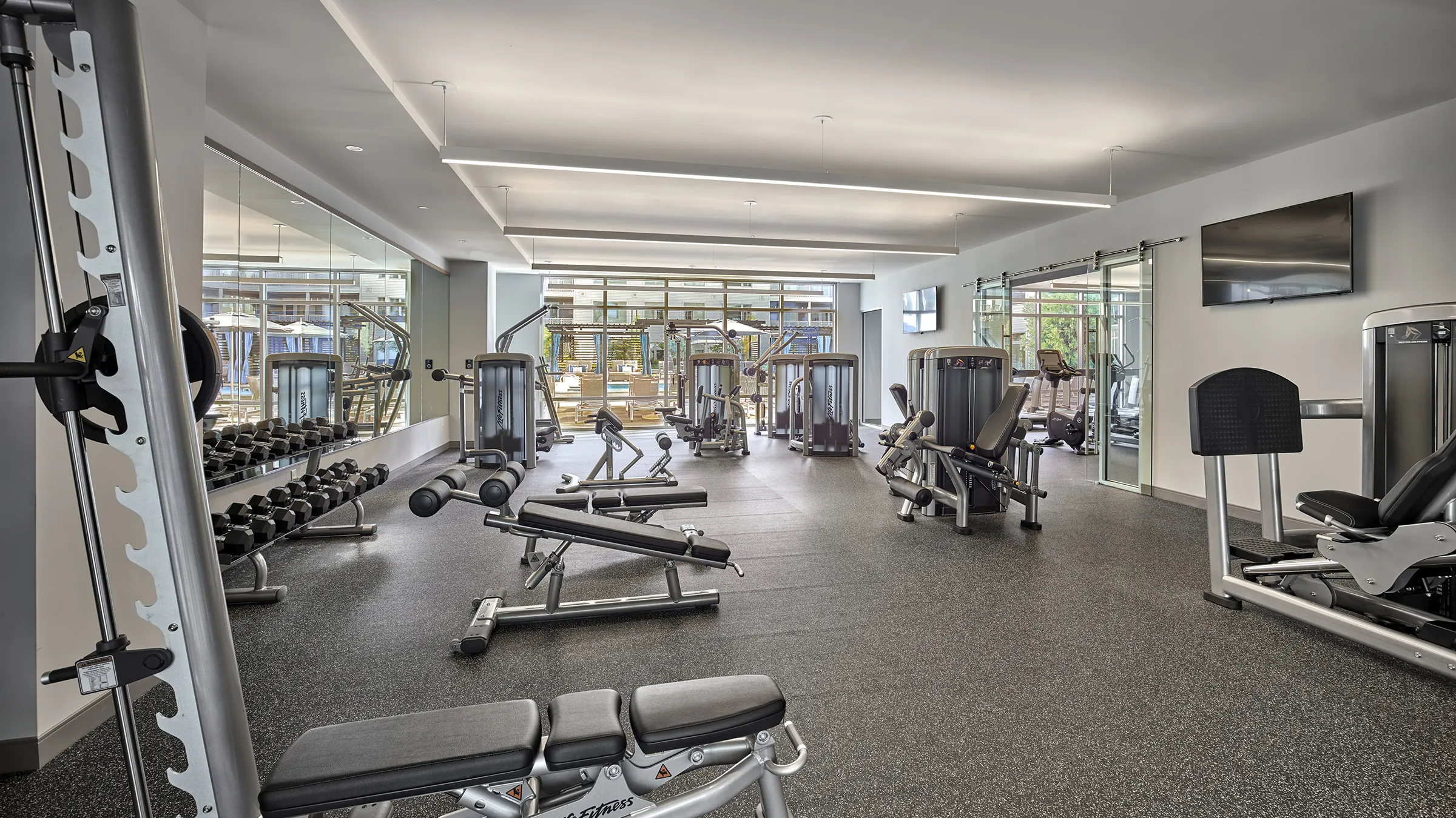 a large gym with exercise equipment