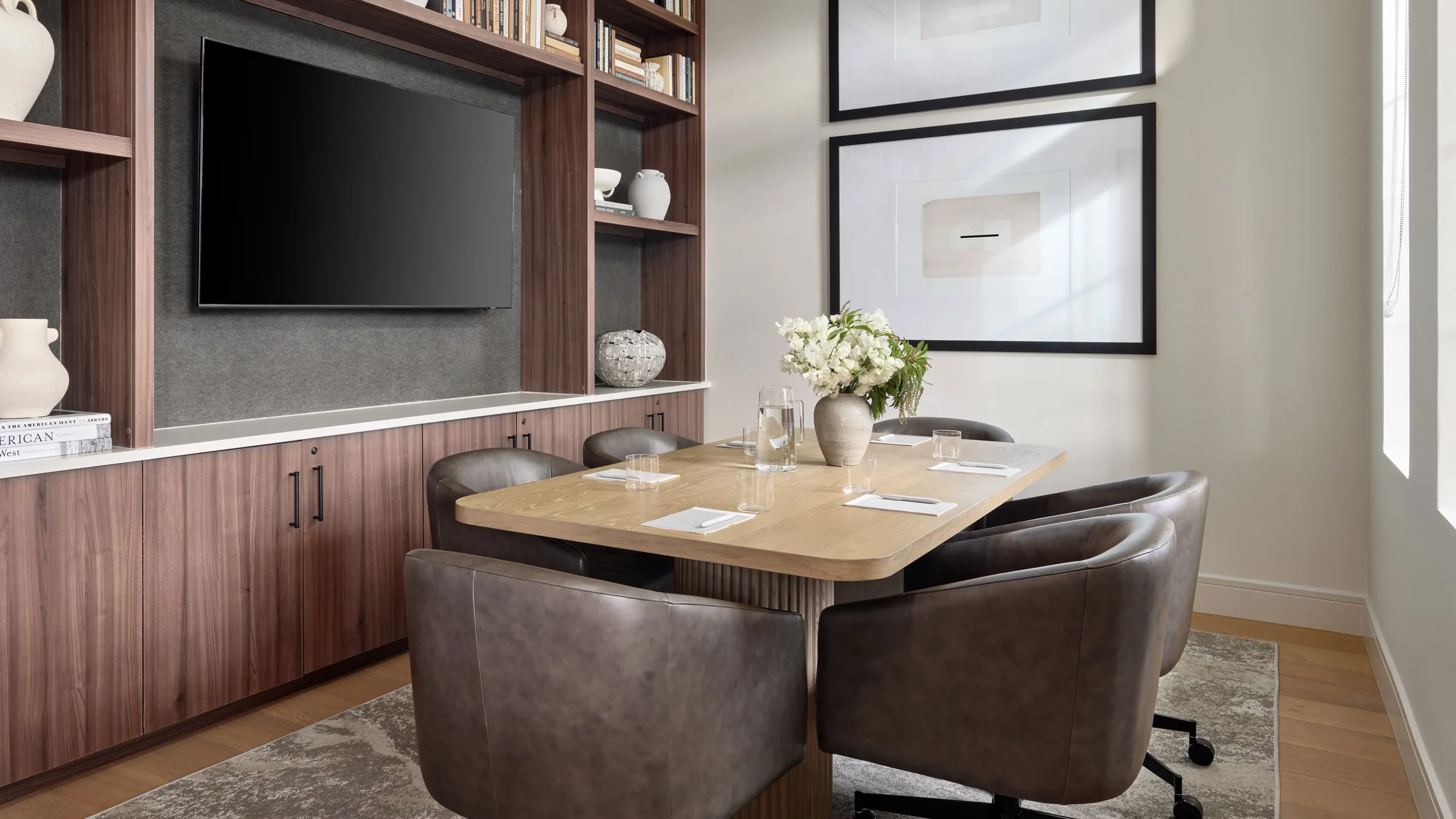 a room with a table and chairs