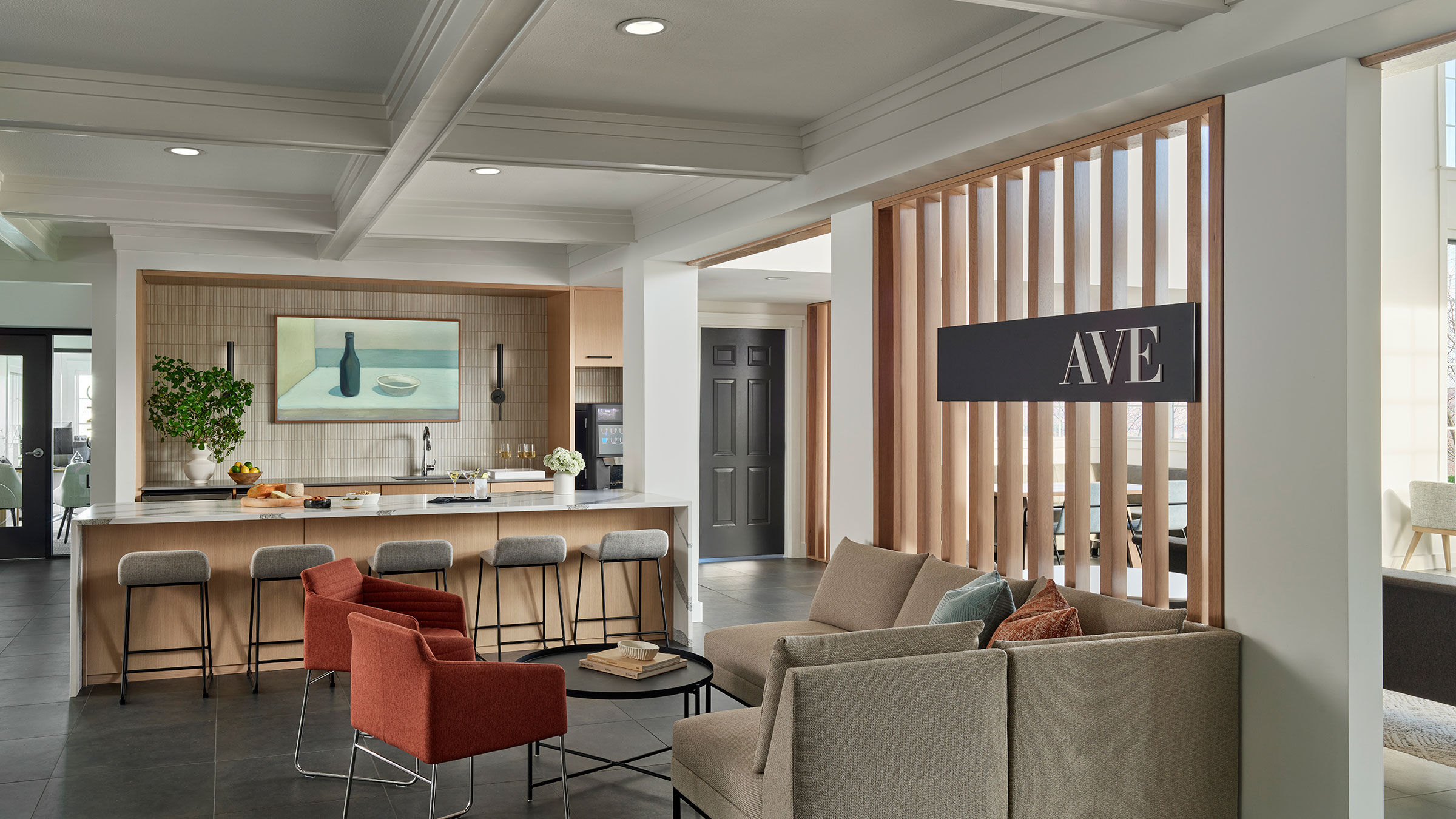 a room with a couch and a bar