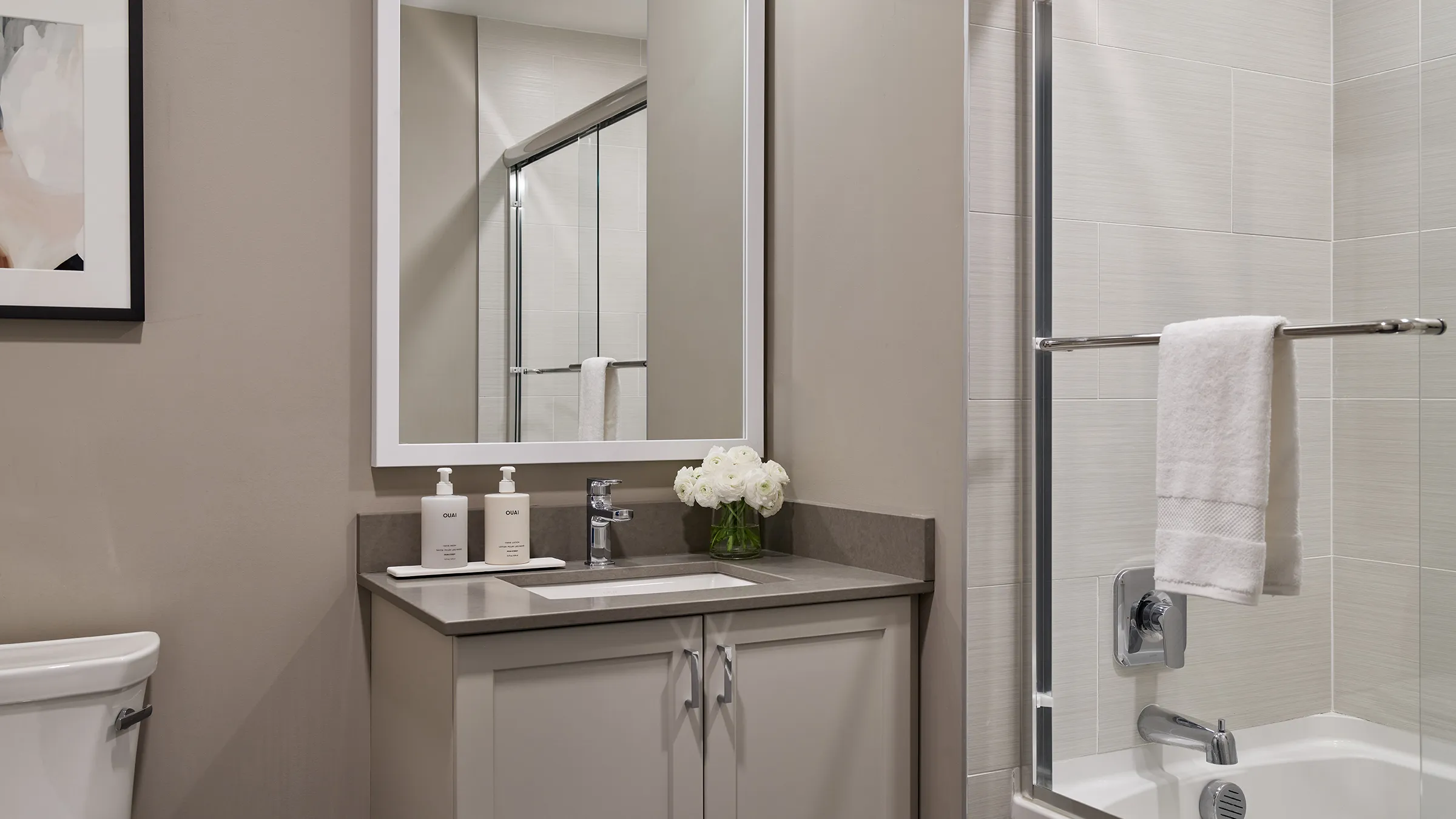 a bathroom with a sink and a shower