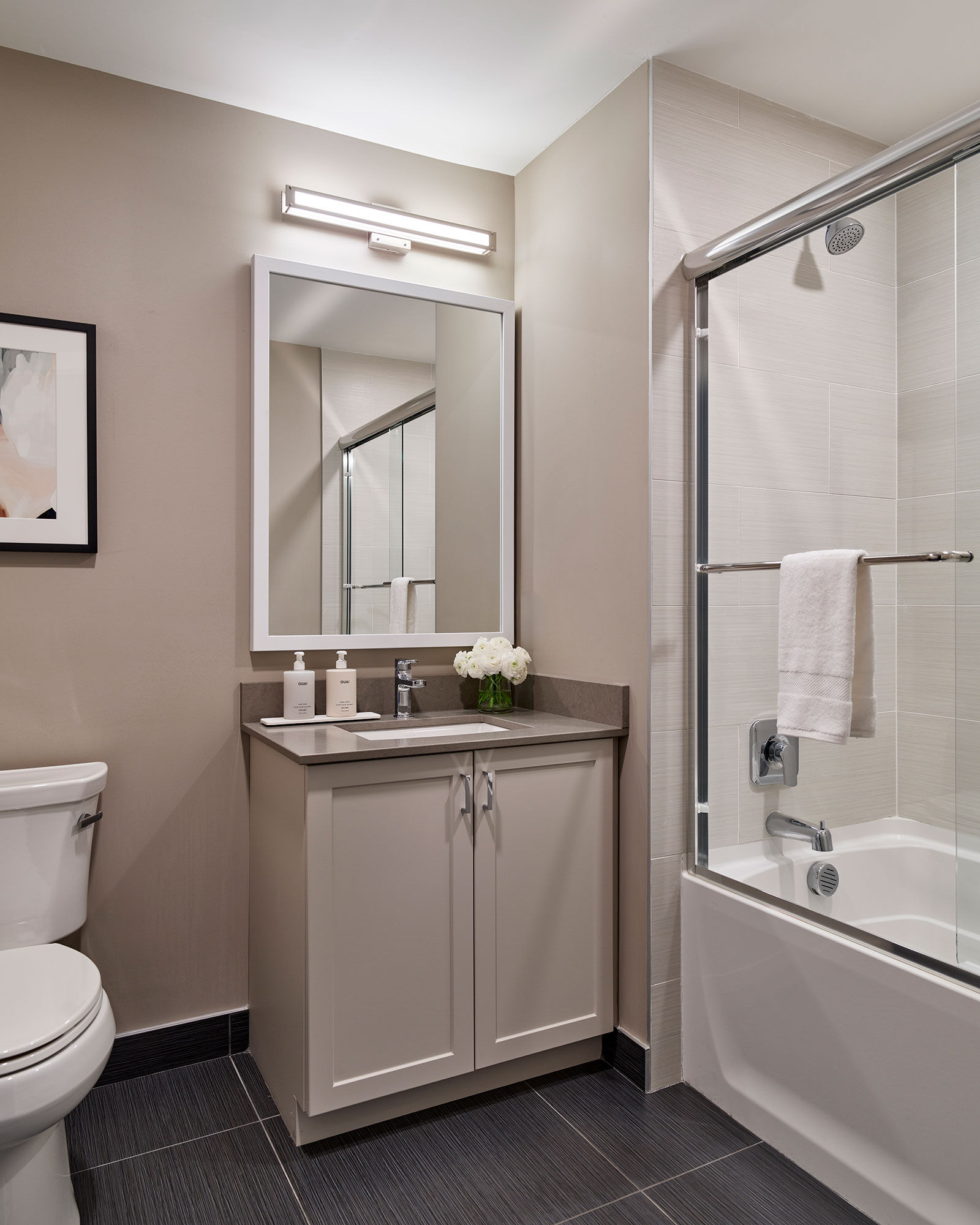 a bathroom with a sink and a shower