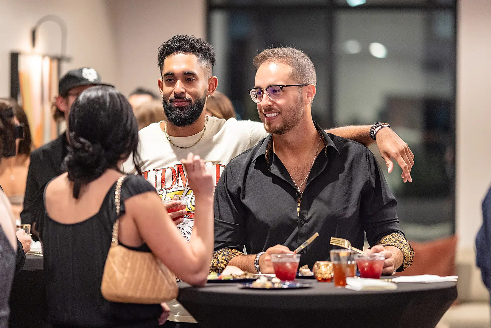 a group of people sitting at a table