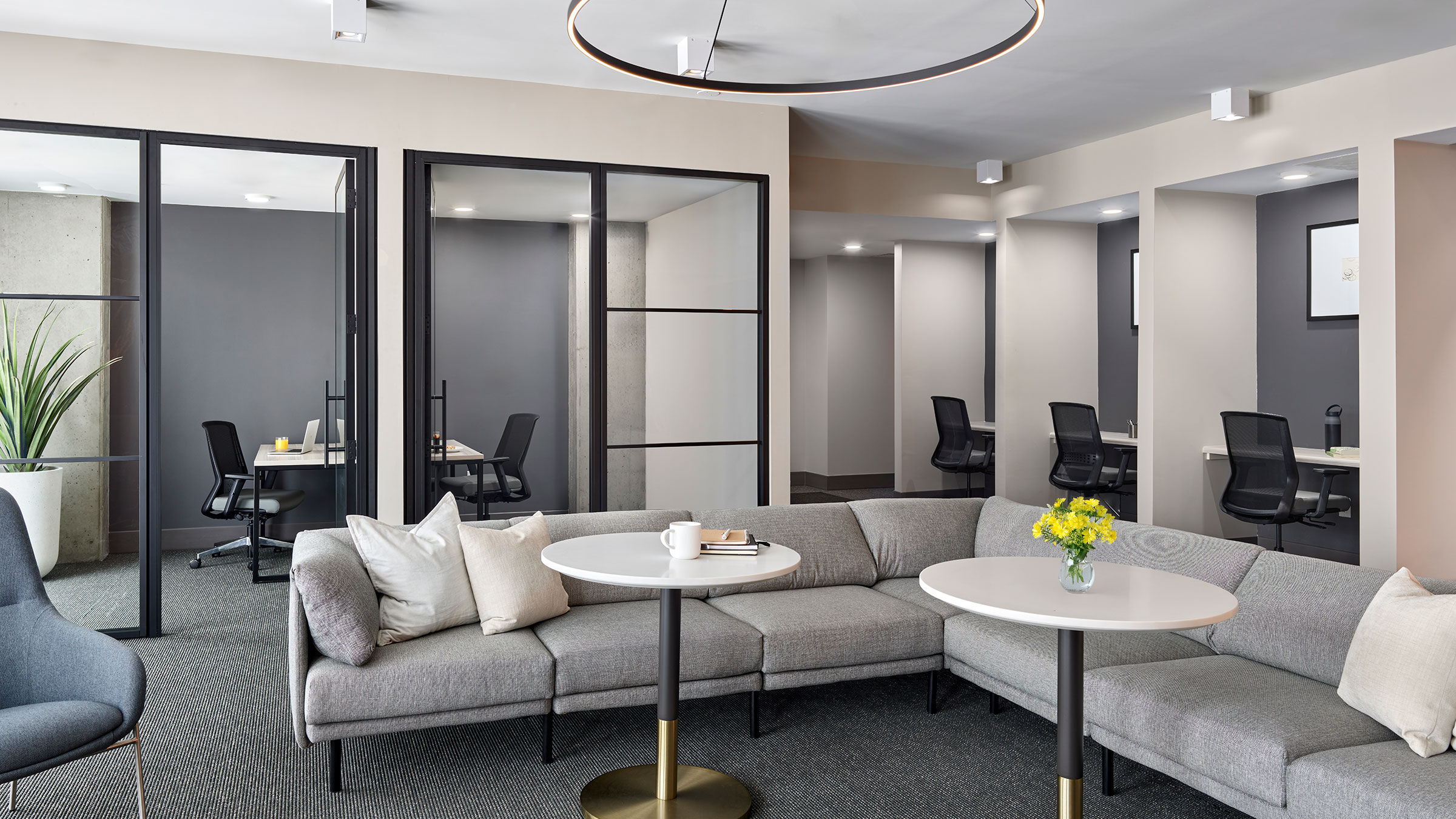 a couch and tables in a room