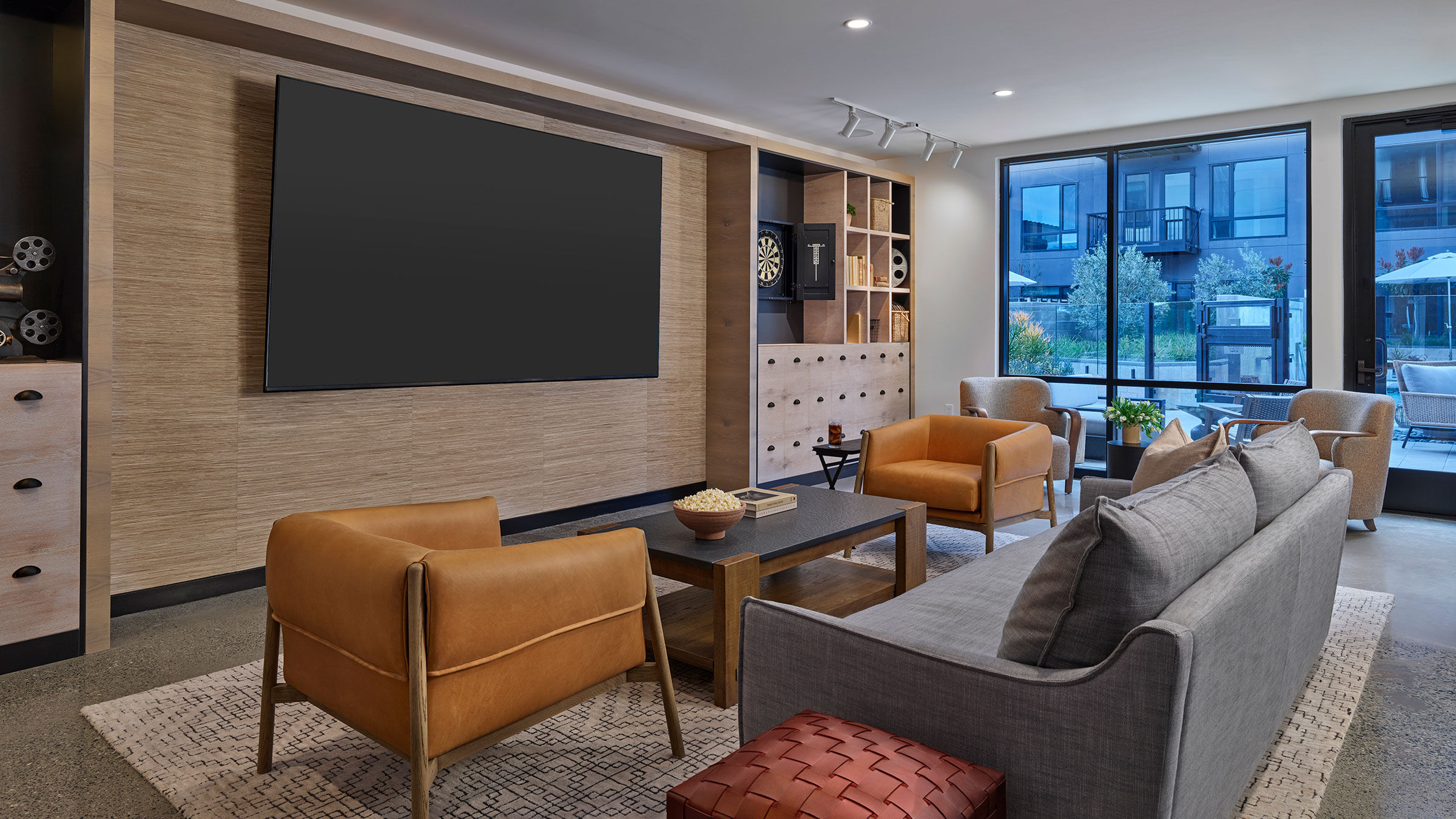 a room with a television and couches