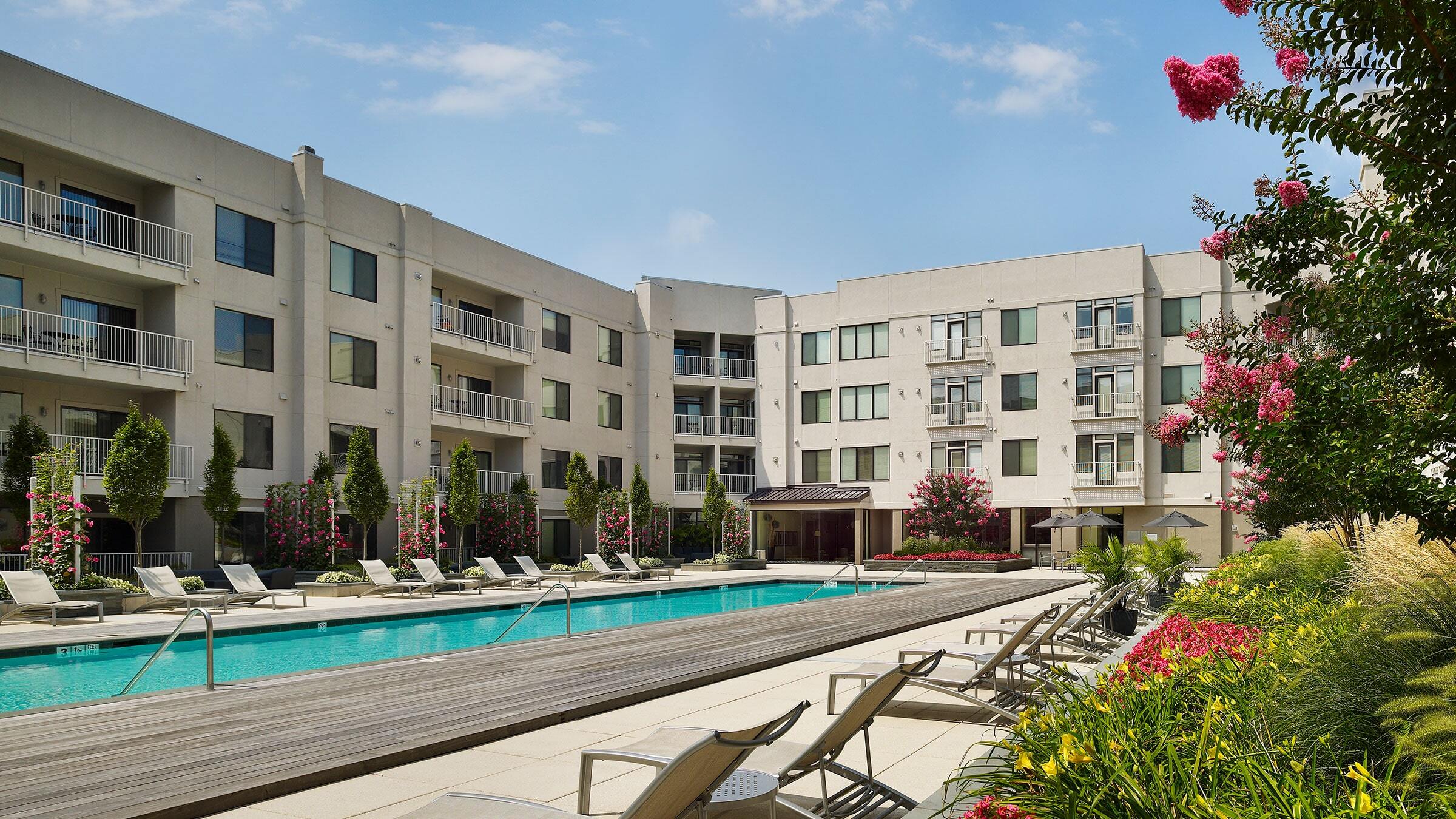 a pool in front of a building