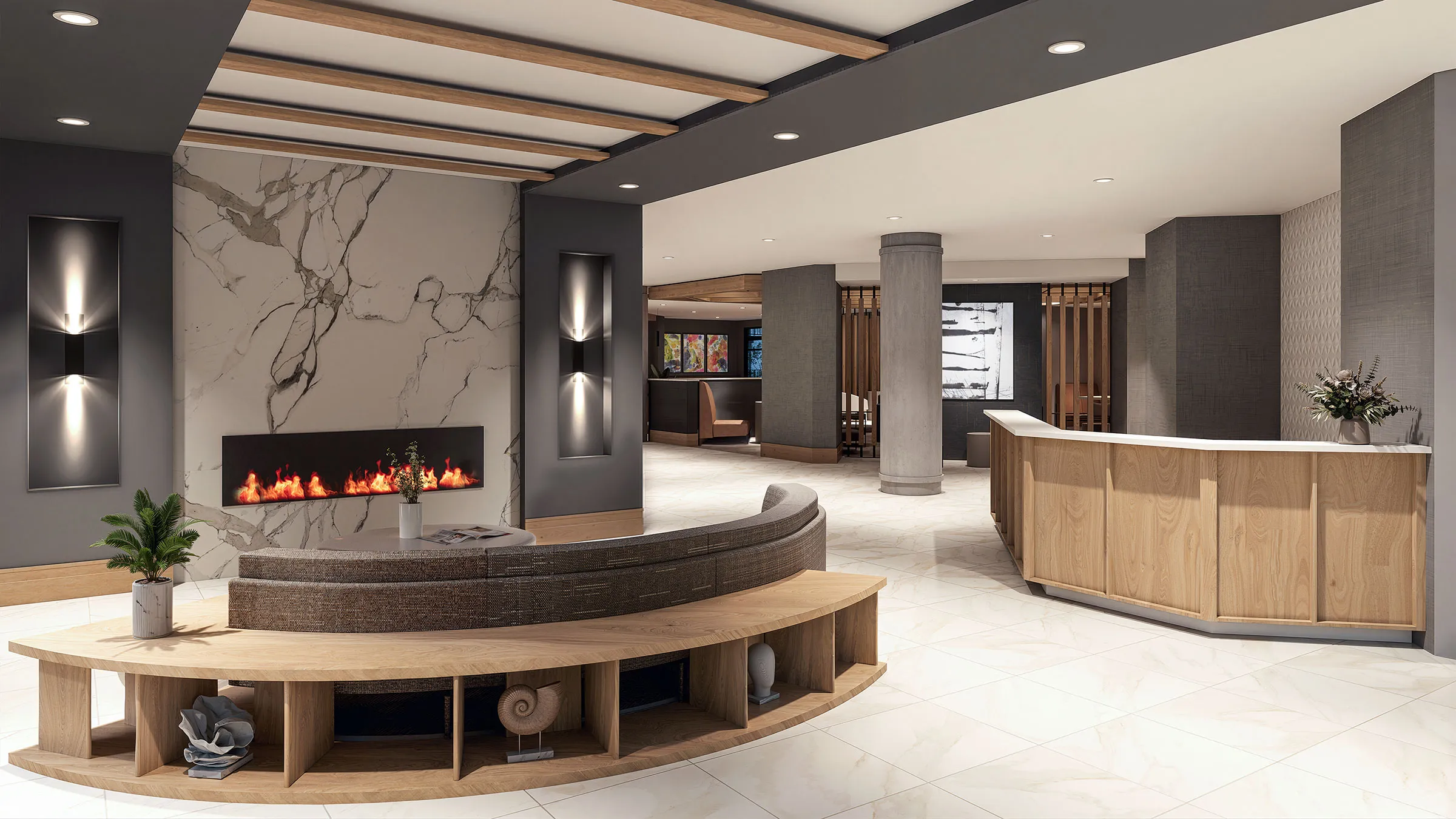 a lobby with a fireplace and a round table