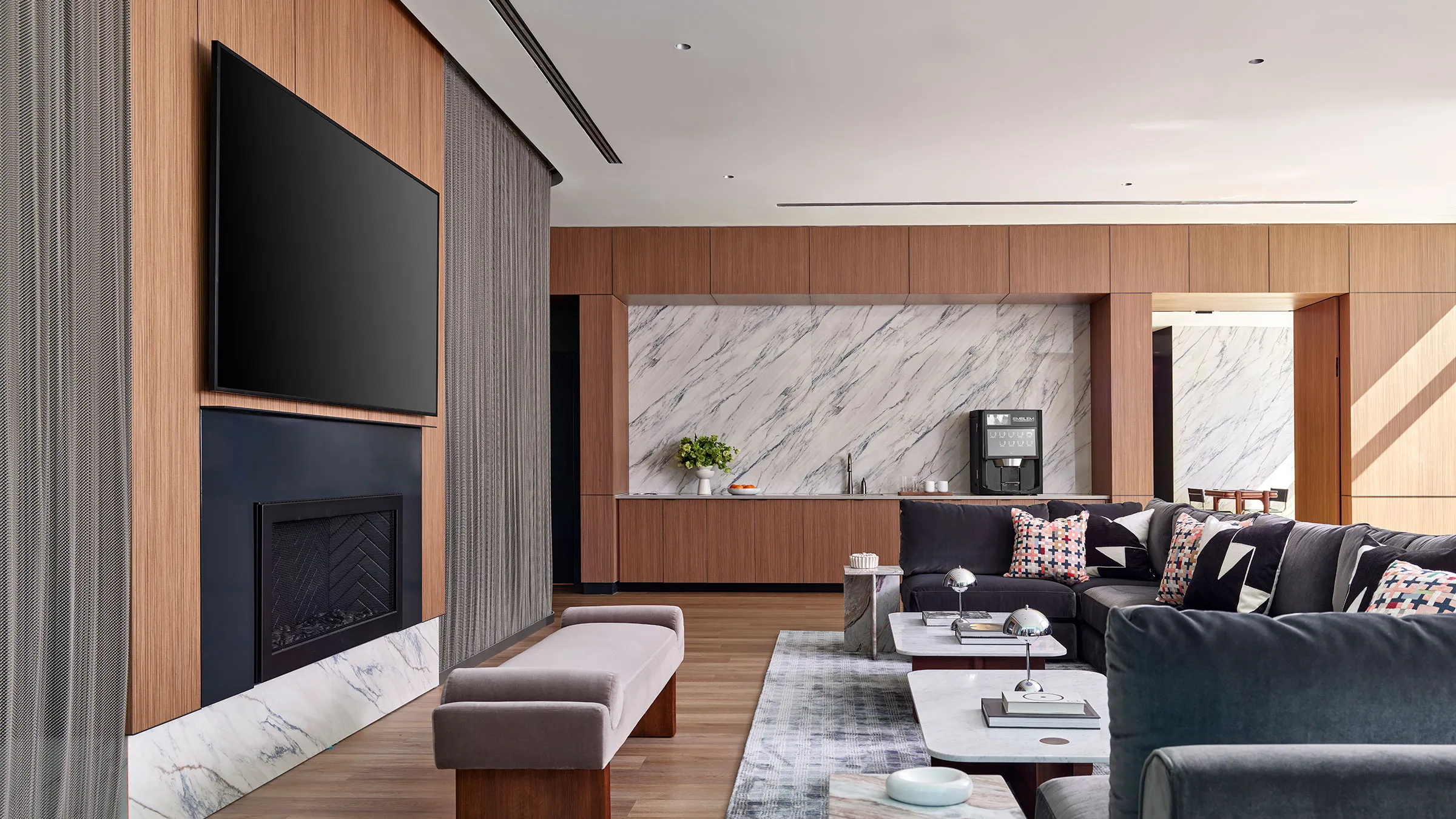 a living room with a fireplace and a couch