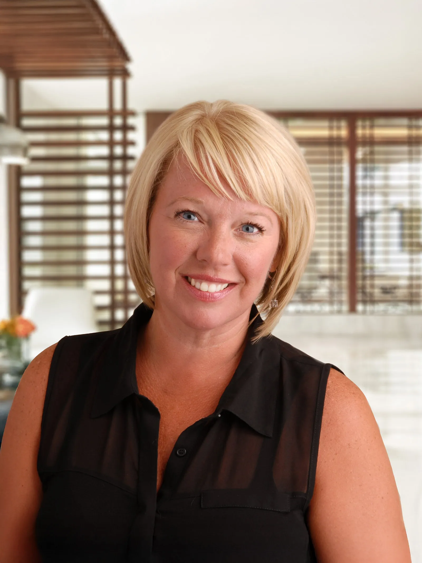 a woman smiling at camera