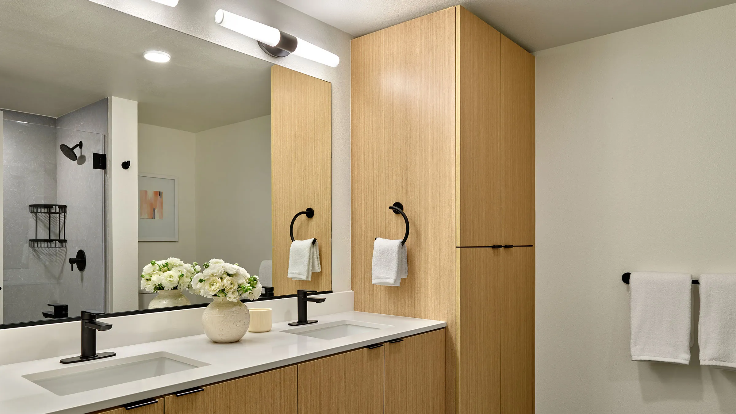 a bathroom with a sink and mirror