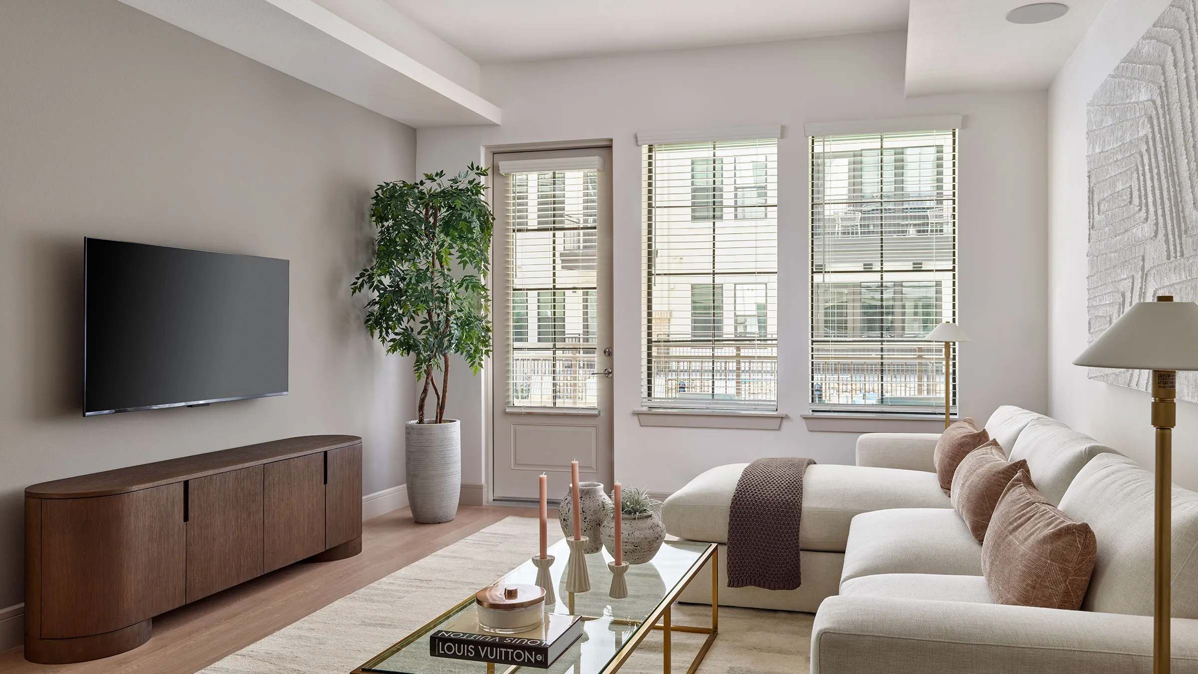 a living room with a couch and a tv