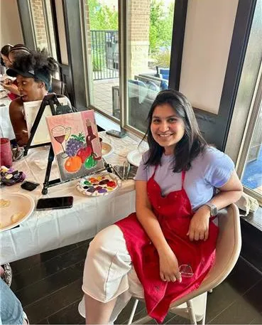 a woman sitting in a chair