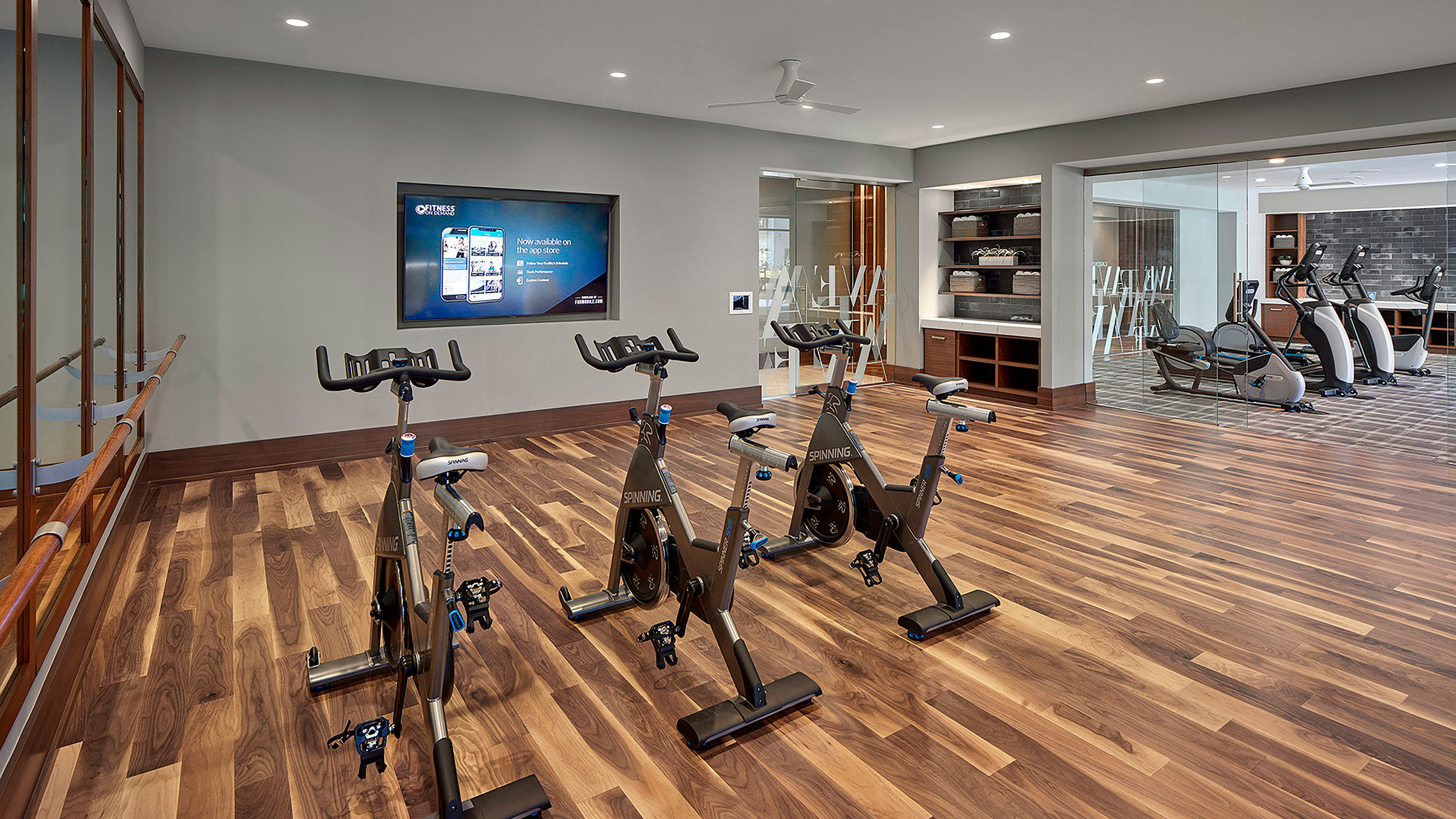 a group of exercise bikes in a room