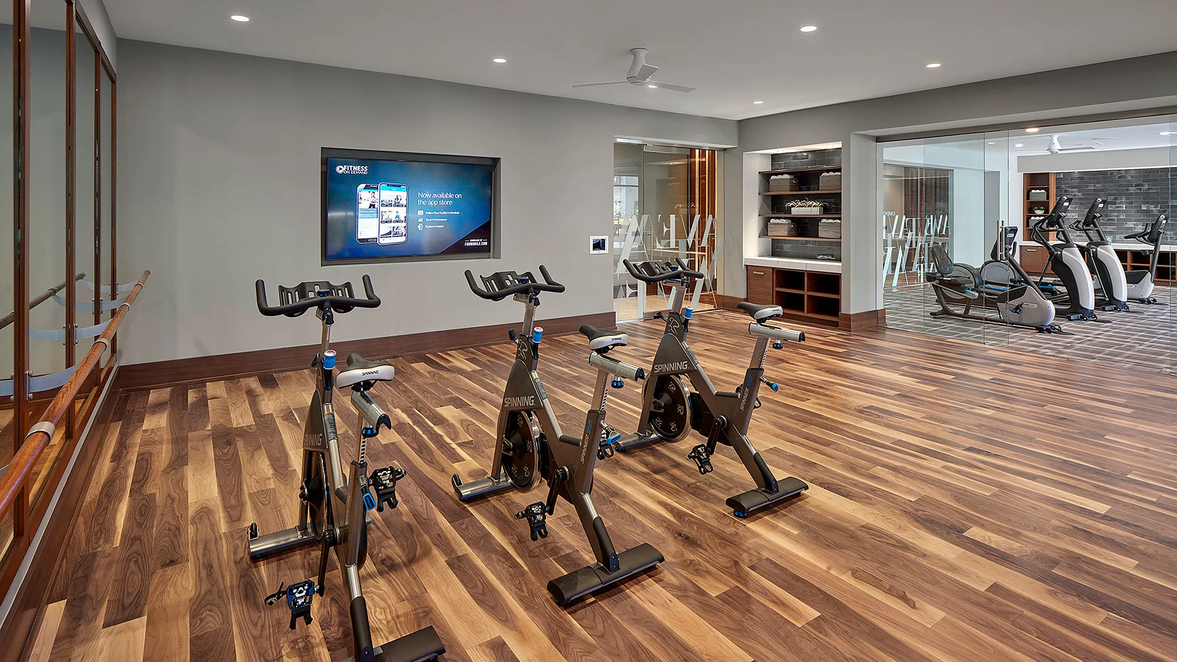 a group of exercise bikes in a room