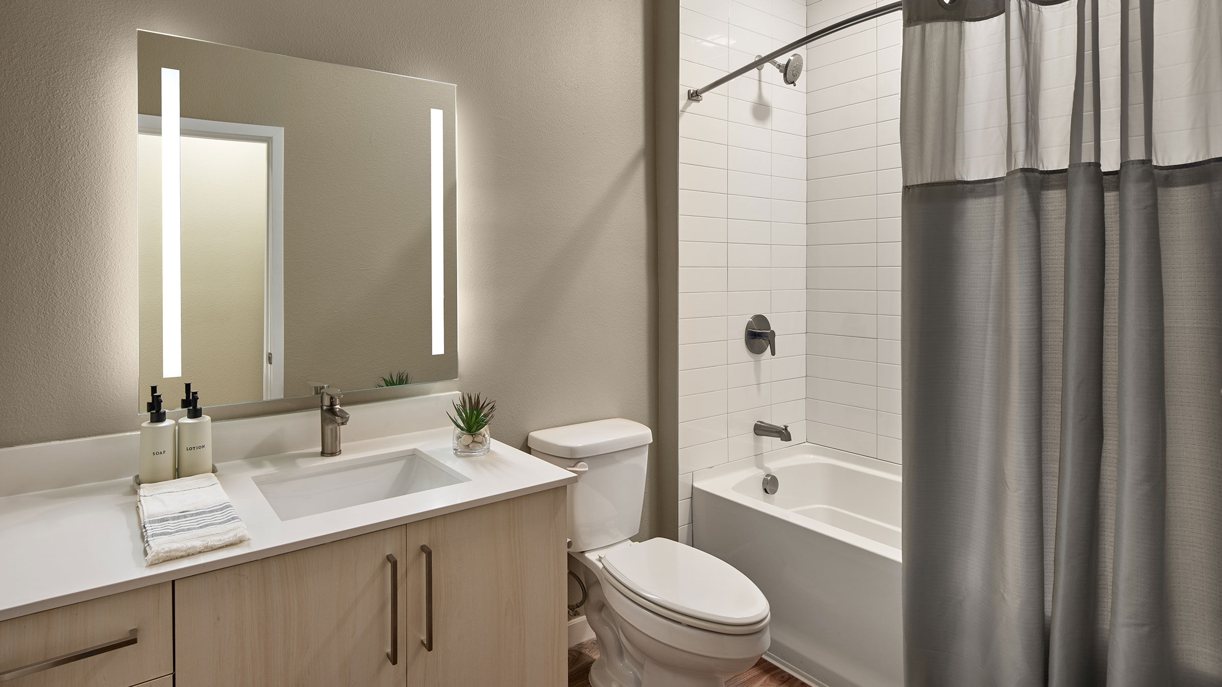 a bathroom with a sink and toilet