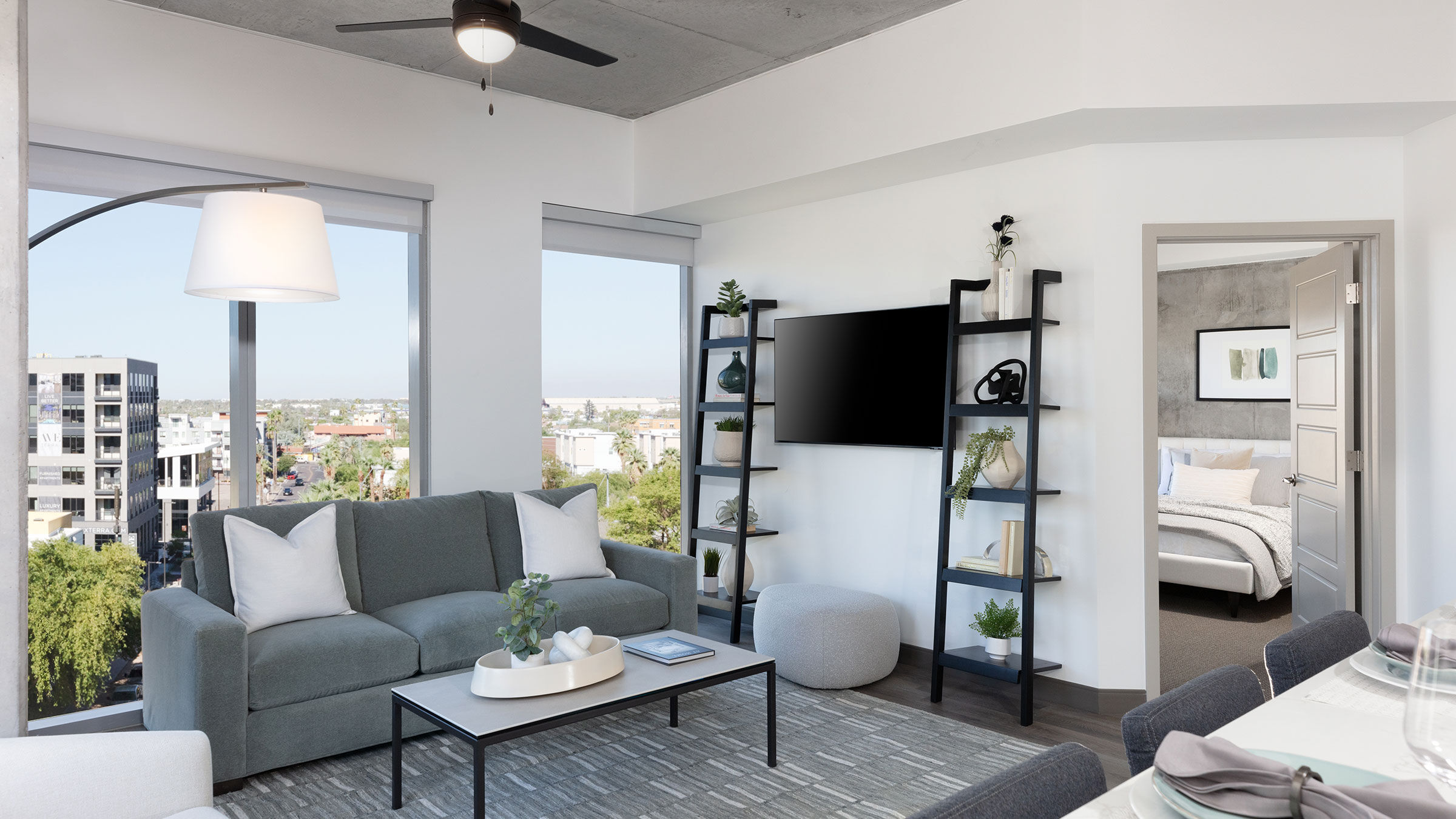 a living room with a couch and a tv