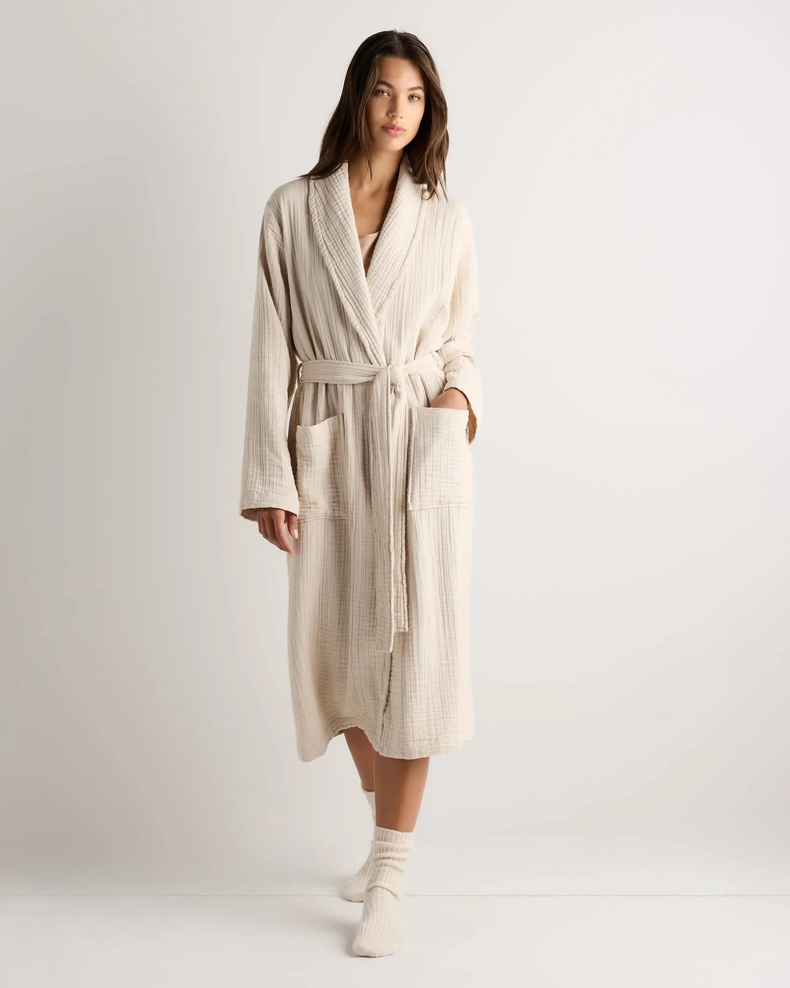 a woman in a white robe