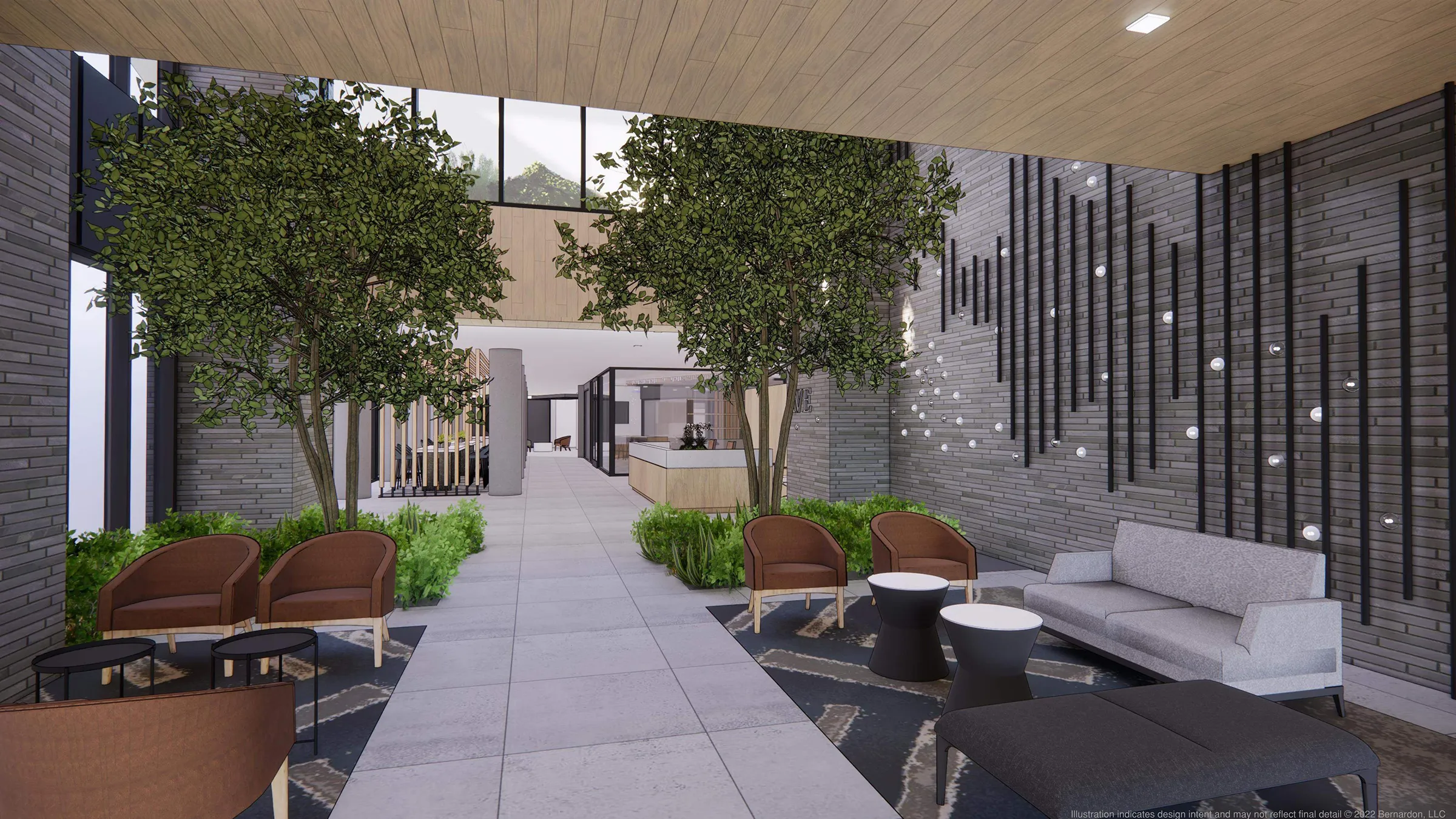 a room with a tree and chairs