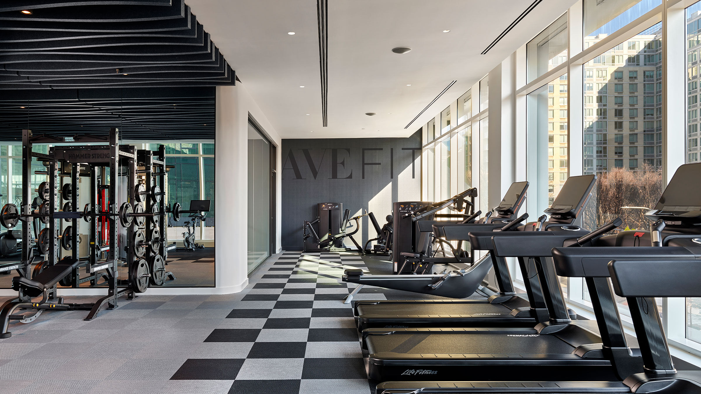 a room with treadmills and exercise equipment