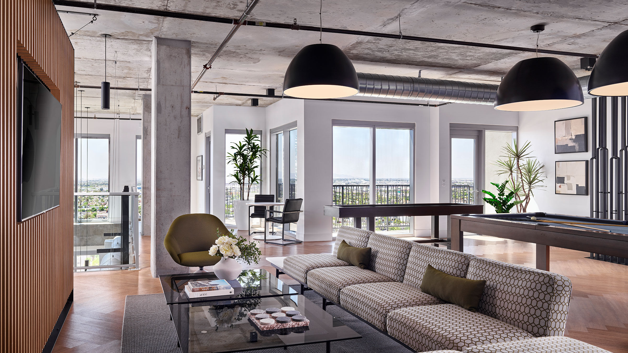 a living room with a couch and a table