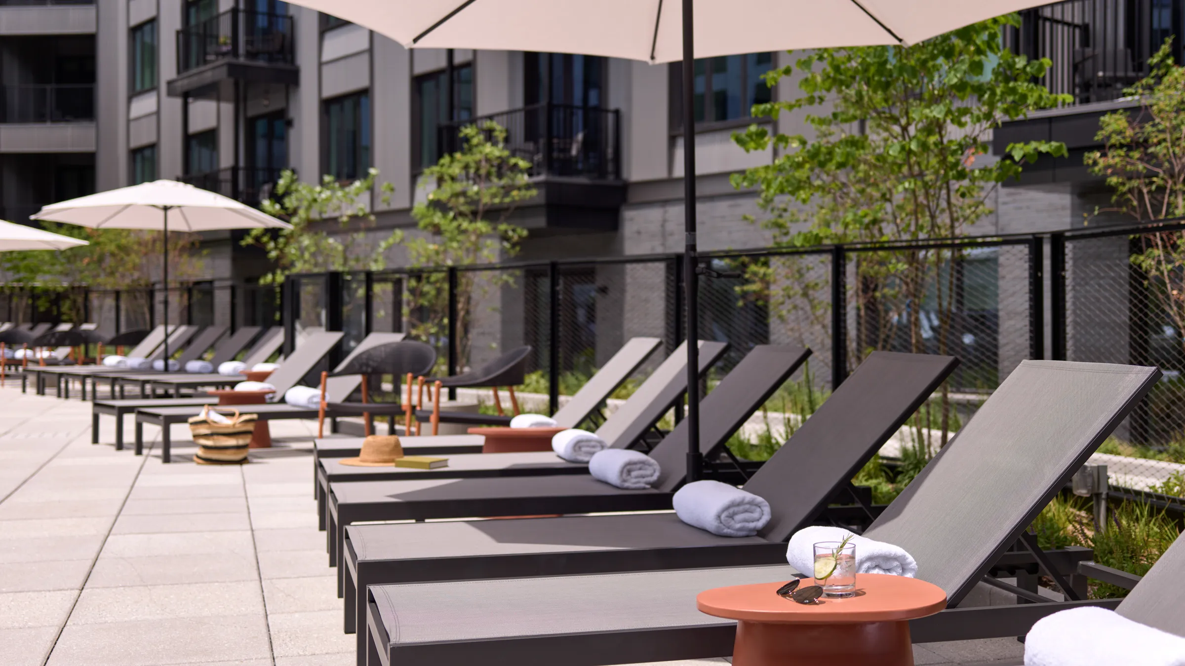resort pool and sundeck with sun loungers in philadelphia