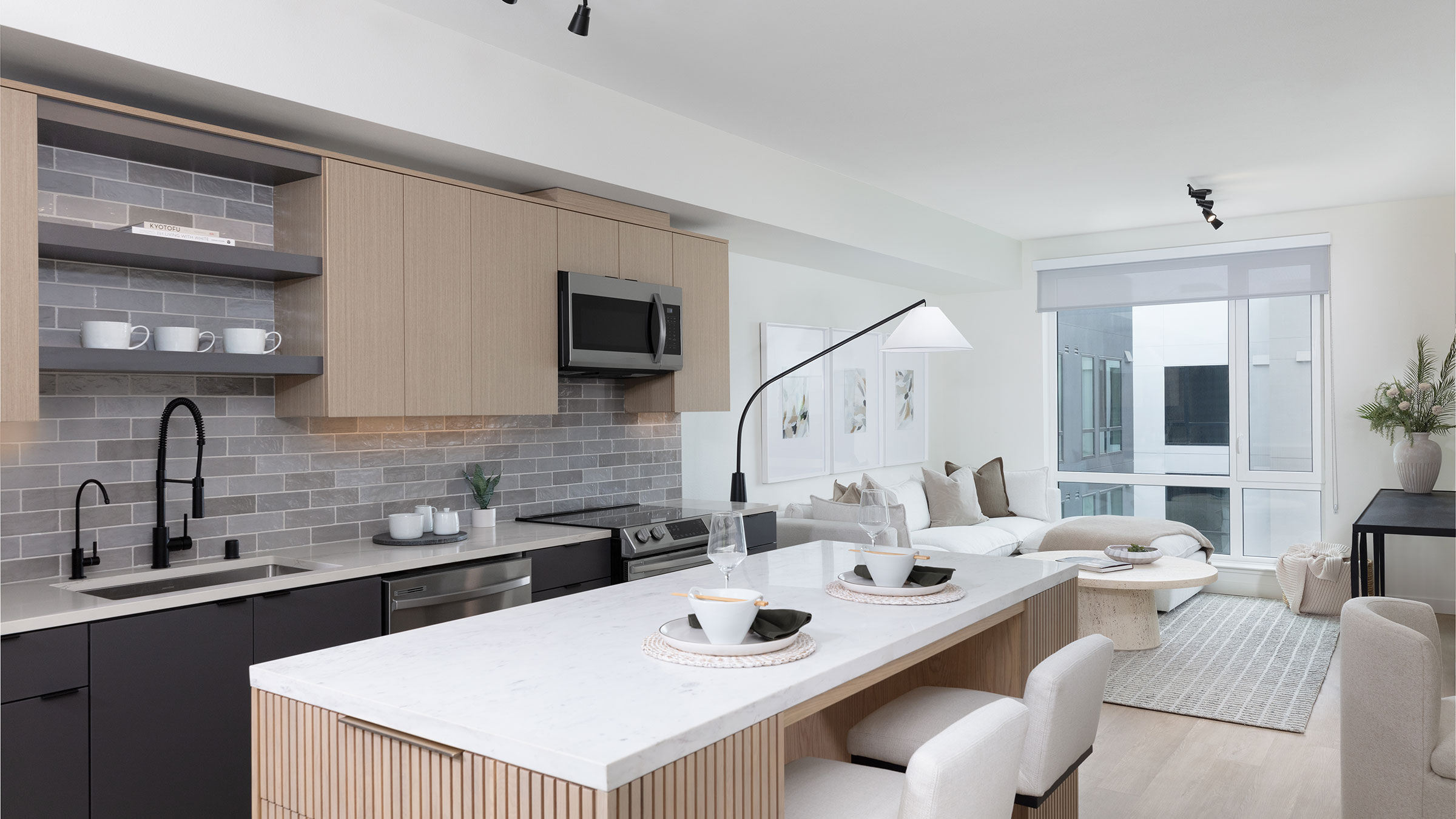 a kitchen with a table and chairs