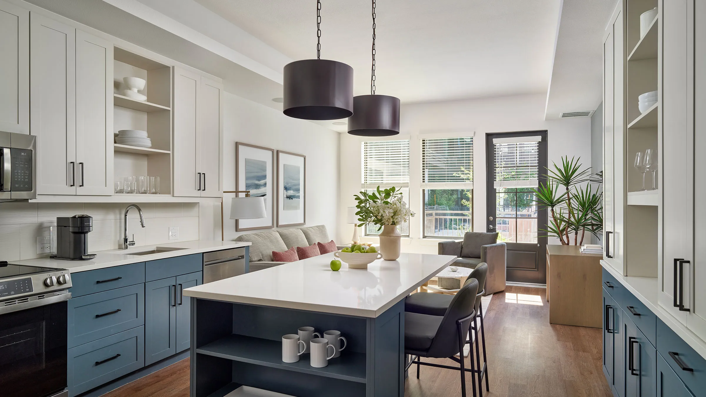 a kitchen with a large island and a couch