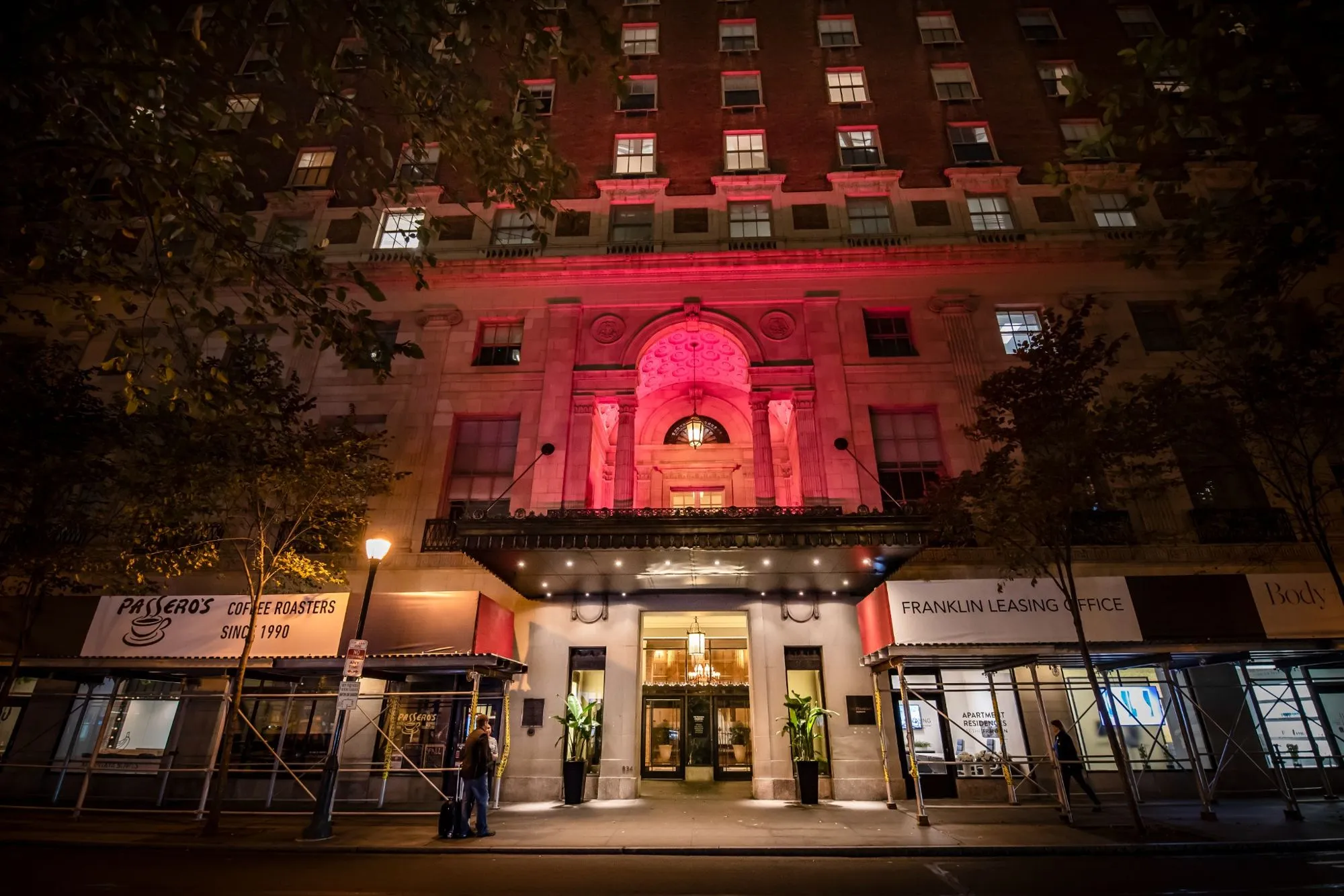 A building with pink lights