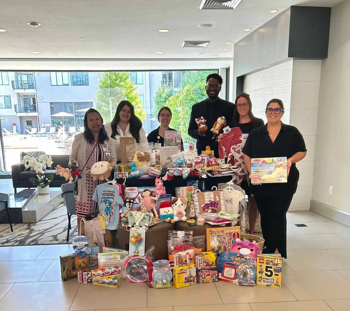 a group of people posing for a photo