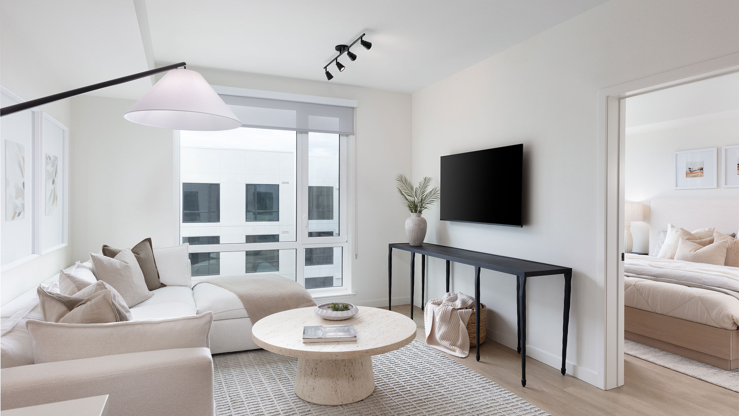 a living room with a tv and a couch