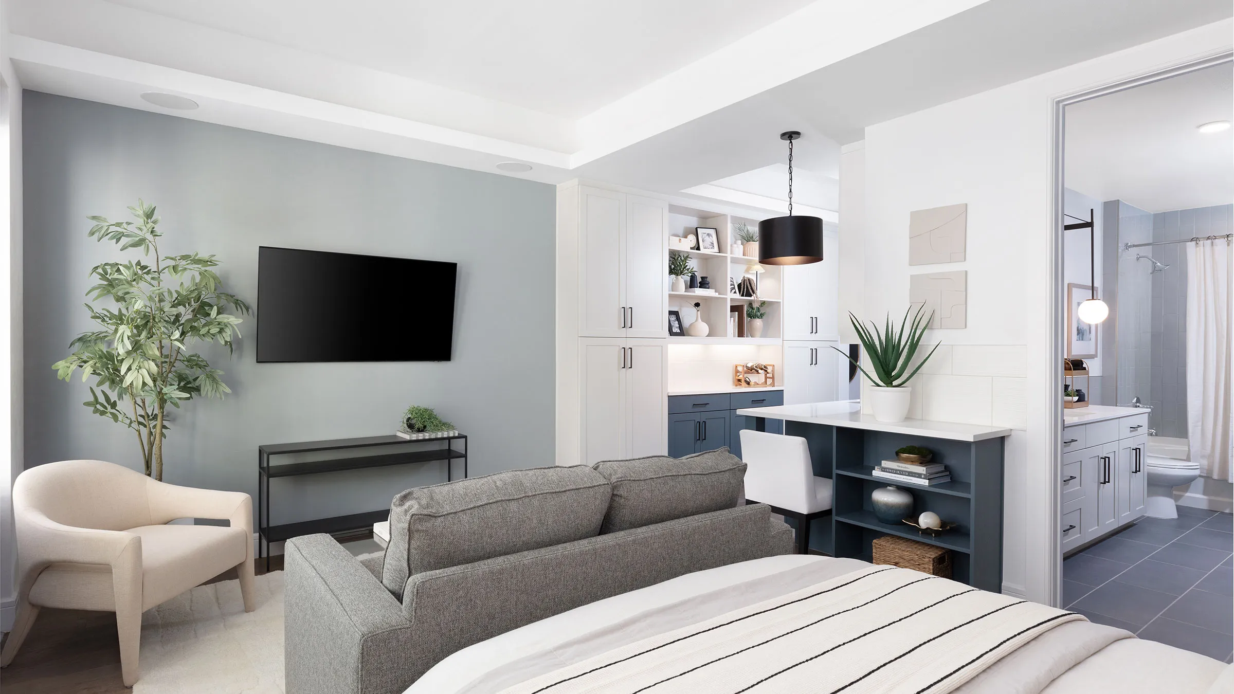 a living room with a couch and tv