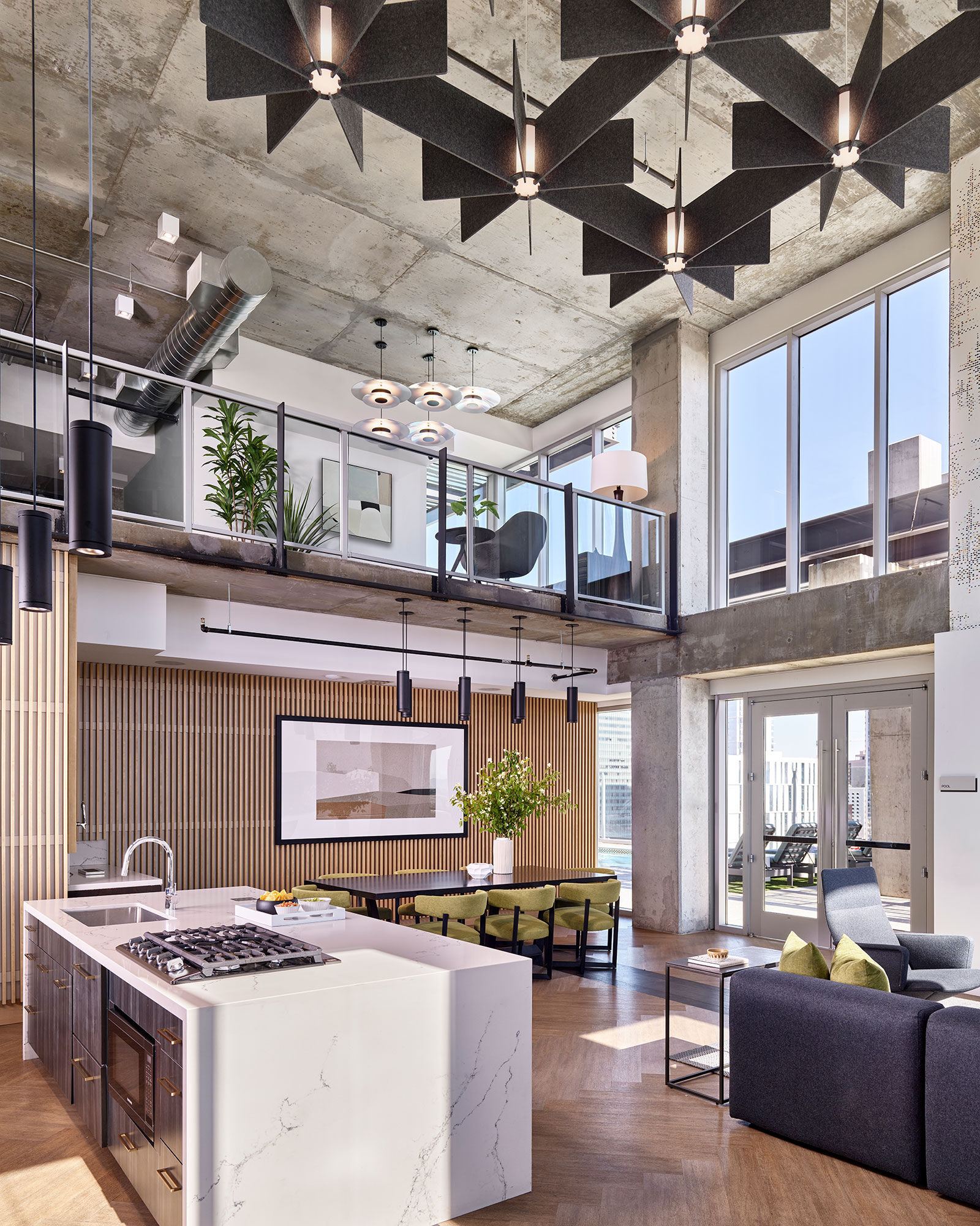 a room with a kitchen and a living room