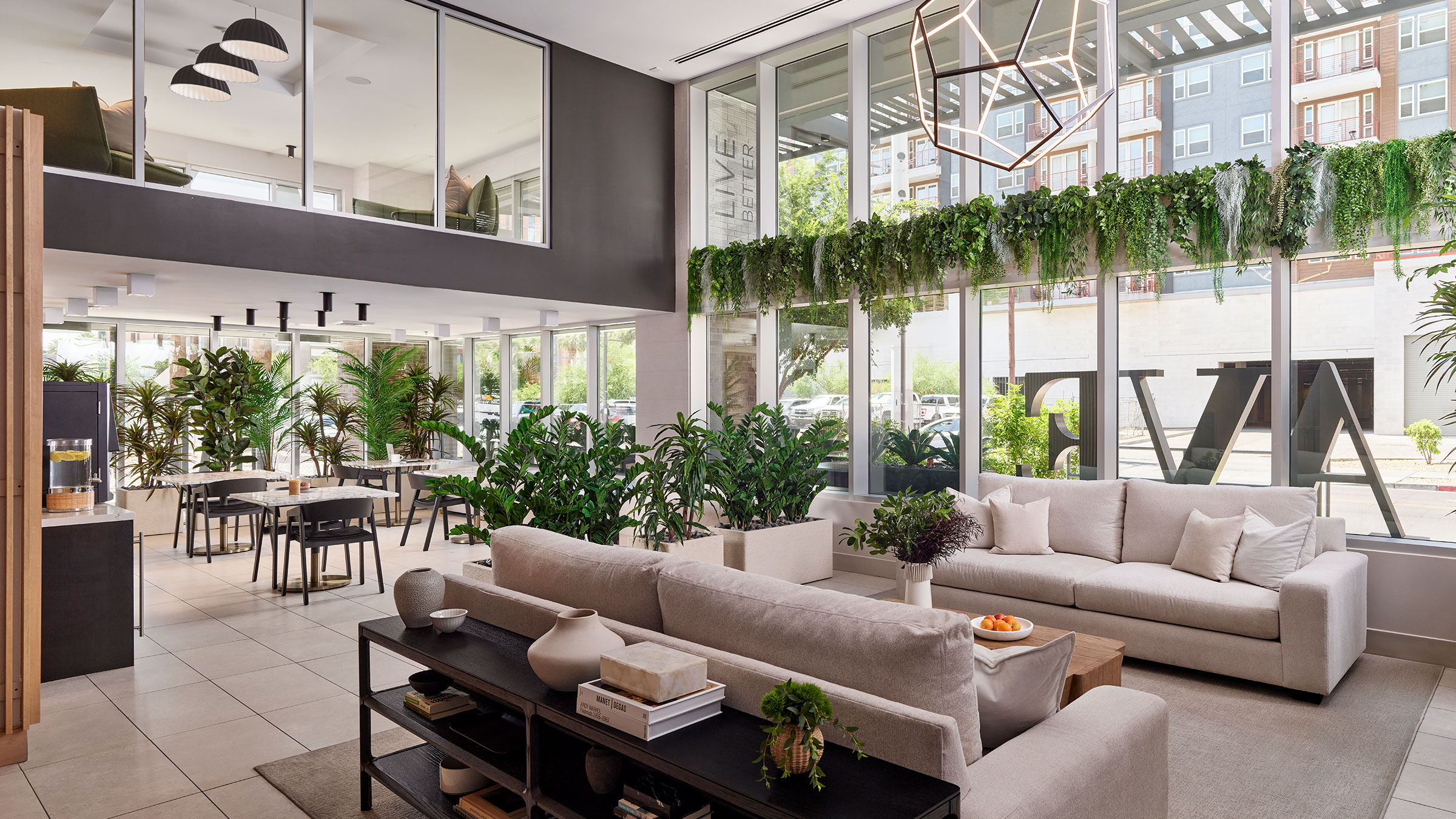 a room with a large window and a couch