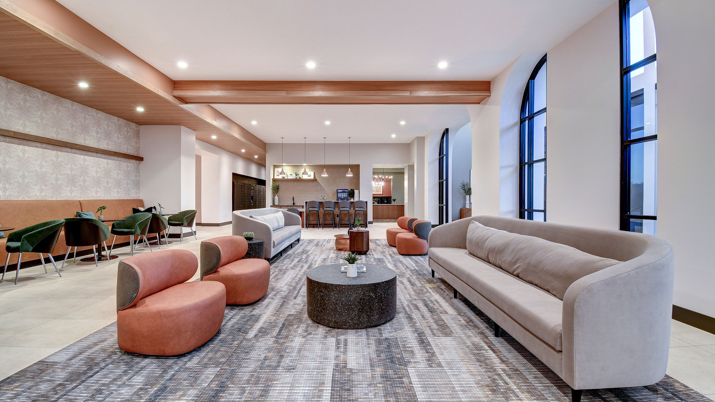 a room with couches and tables