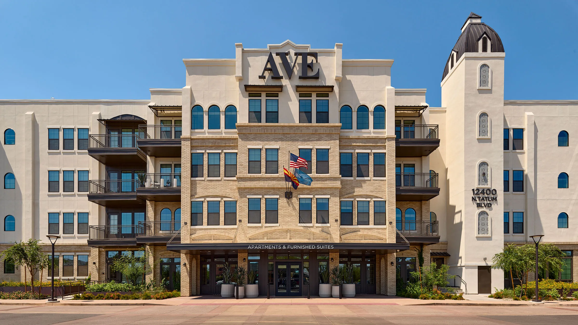 a building with flags on the front