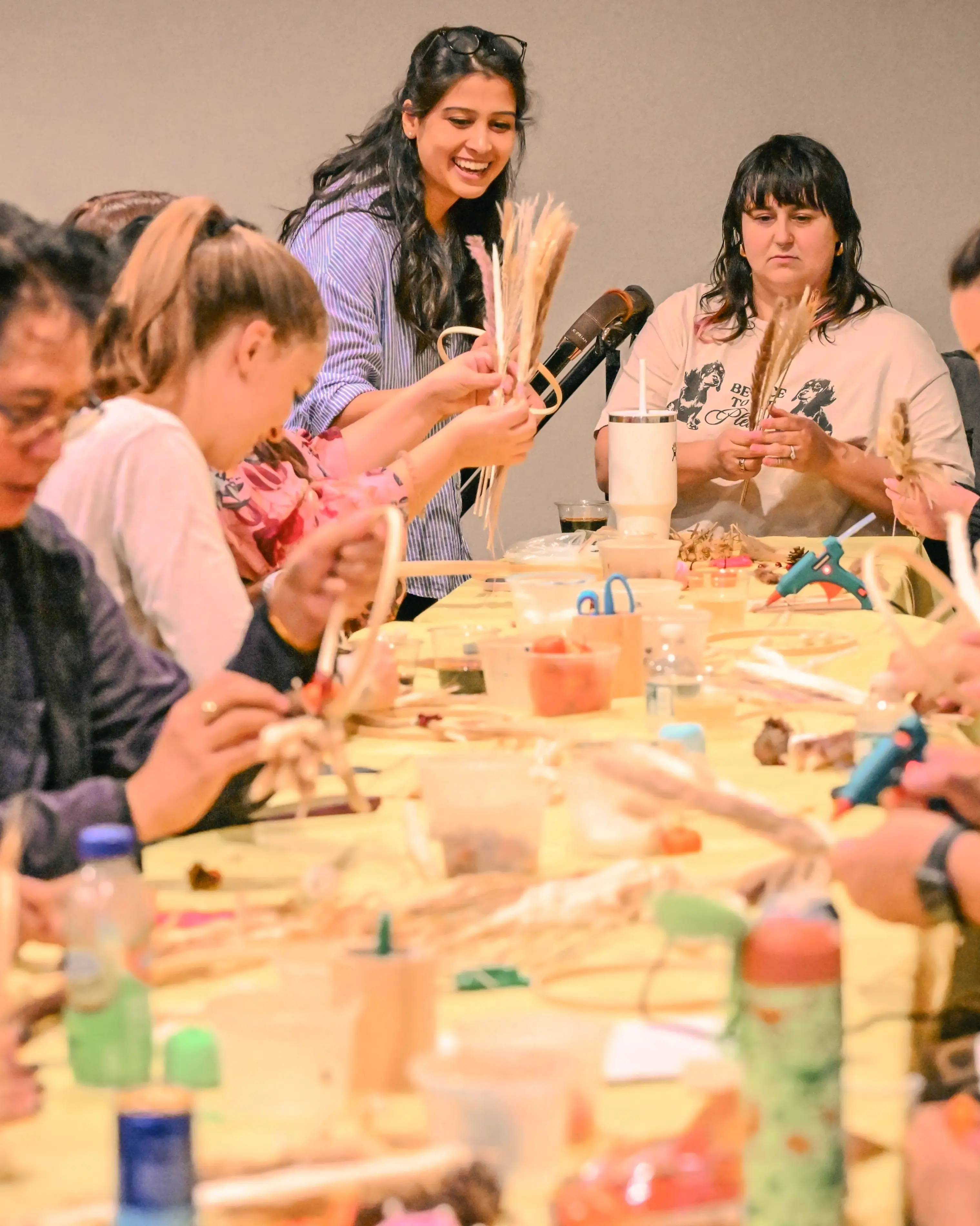 a group of people sitting around a table